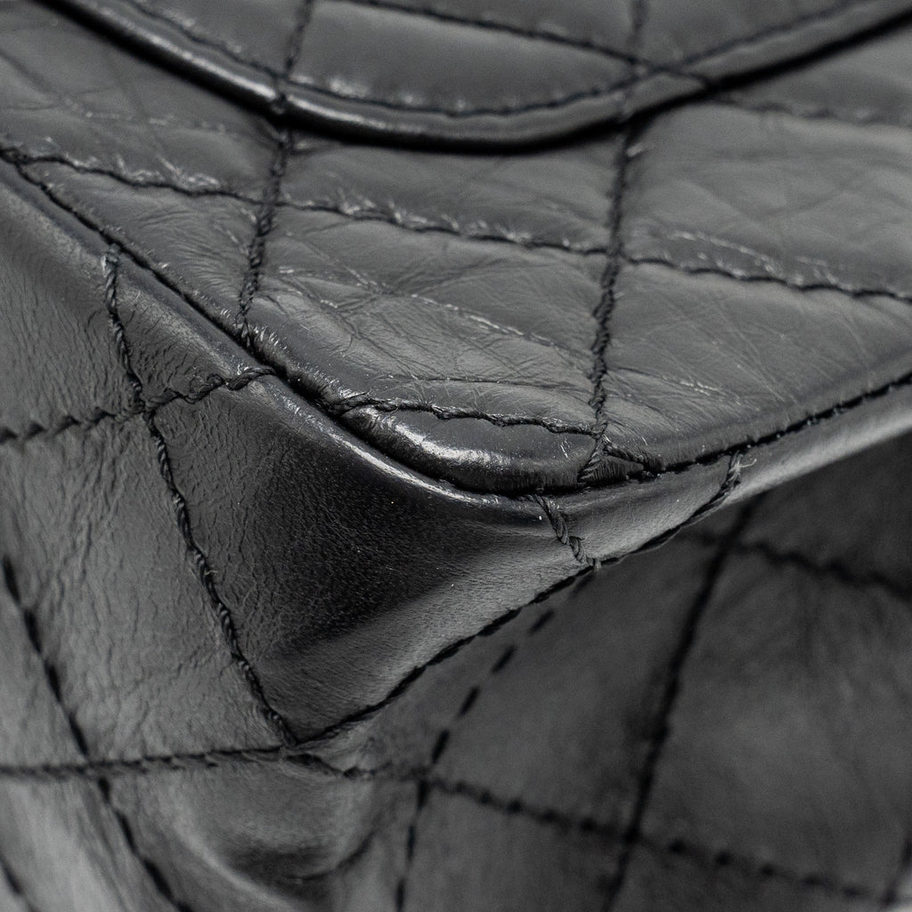 CHANEL MINI 2.55 REISSUE FLAP BAG AGED CALFSKIN BLACK GHW