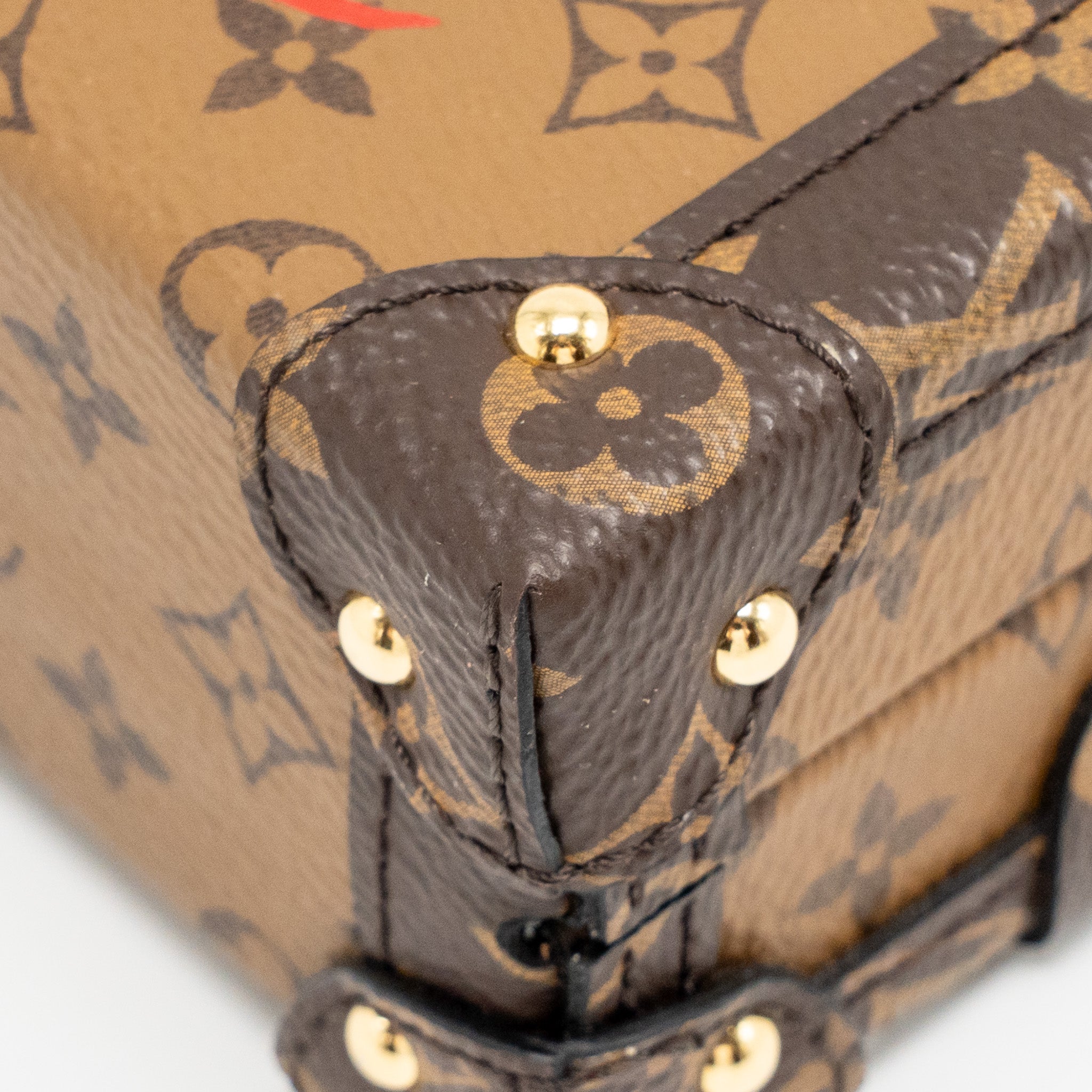 LOUIS VUITTON PETIT MALLE MONOGRAM REVERSE CANVAS GHW