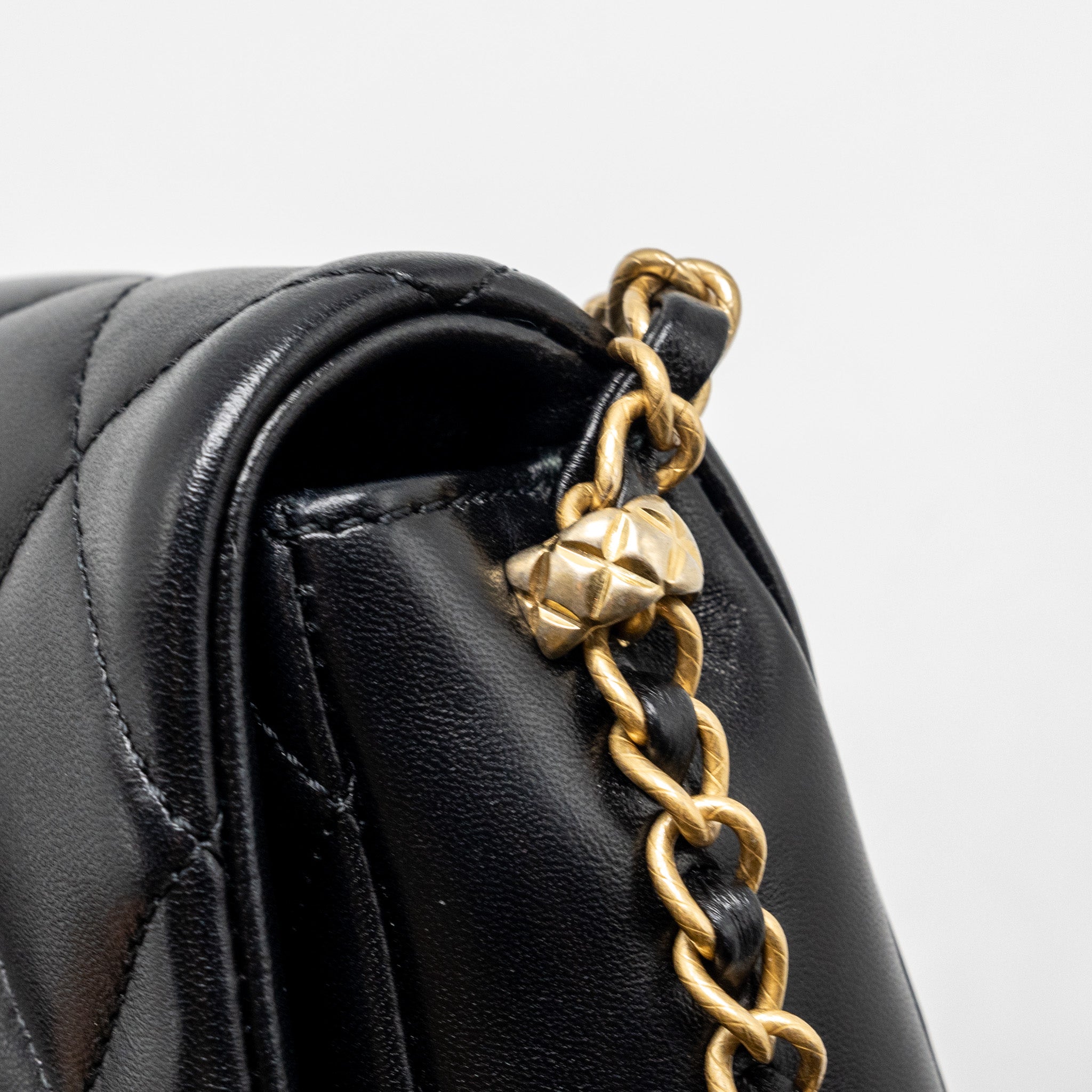 CHANEL QUILTED FLAP BAG WITH DETAILED LOGO AND CHAIN LAMBSKIN BLACK GHW (MICROCHIP)