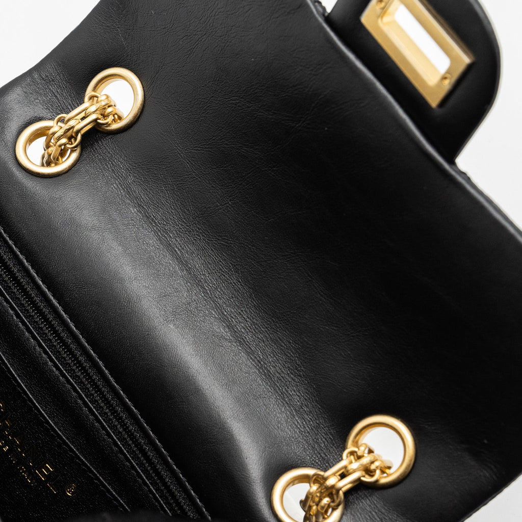 CHANEL MINI 2.55 REISSUE FLAP BAG AGED CALFSKIN BLACK BRUSHED GHW (MICROCHIP)