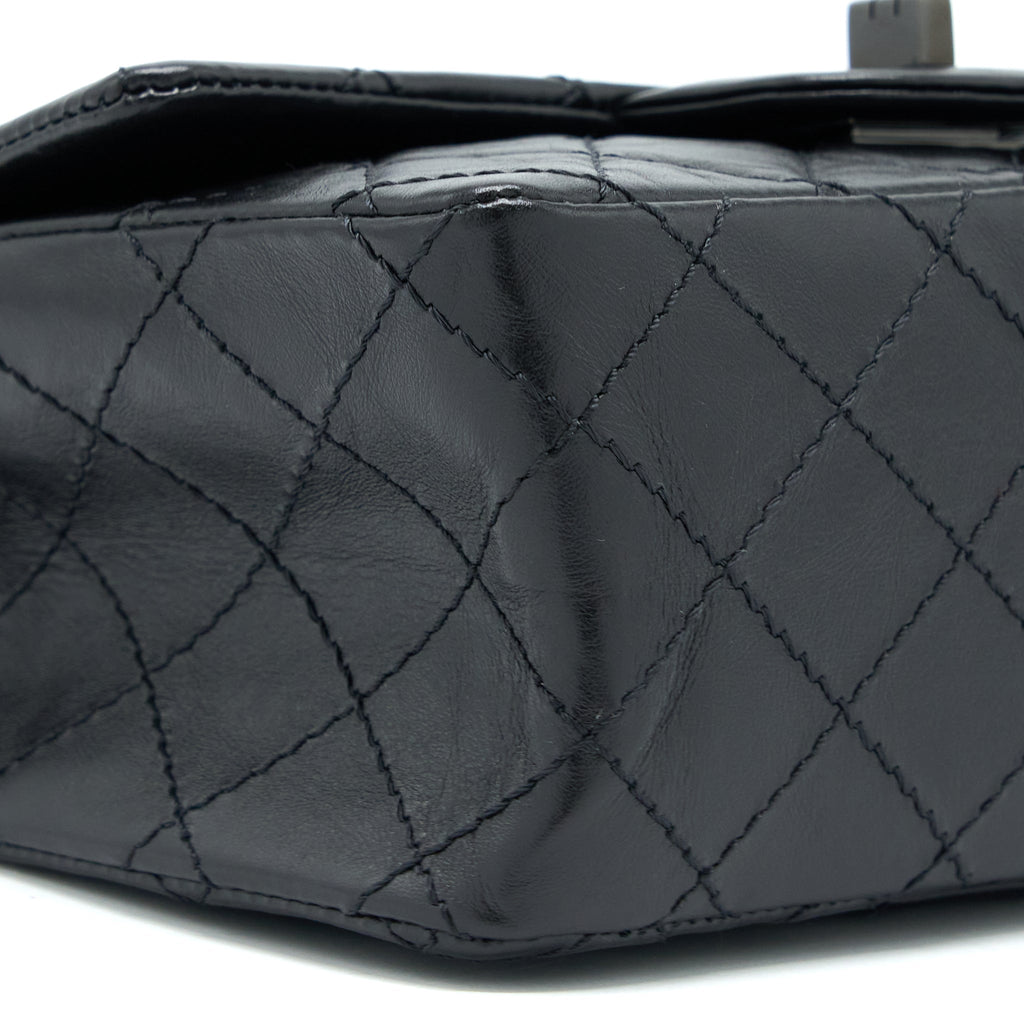 CHANEL MINI 2.55 REISSUE AGED CALFSKIN SO BLACK WITH BLACK HARDWARE (MICROCHIP)