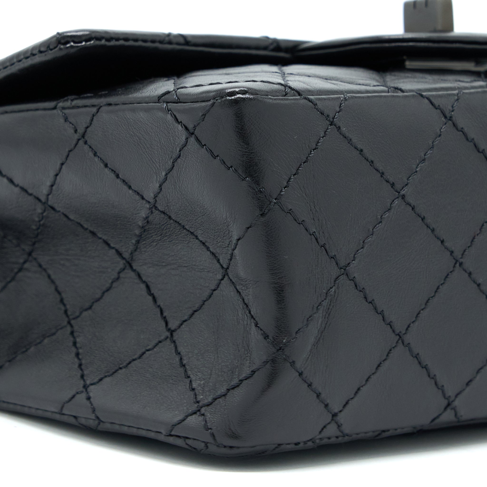 CHANEL MINI 2.55 REISSUE AGED CALFSKIN SO BLACK WITH BLACK HARDWARE (MICROCHIP)