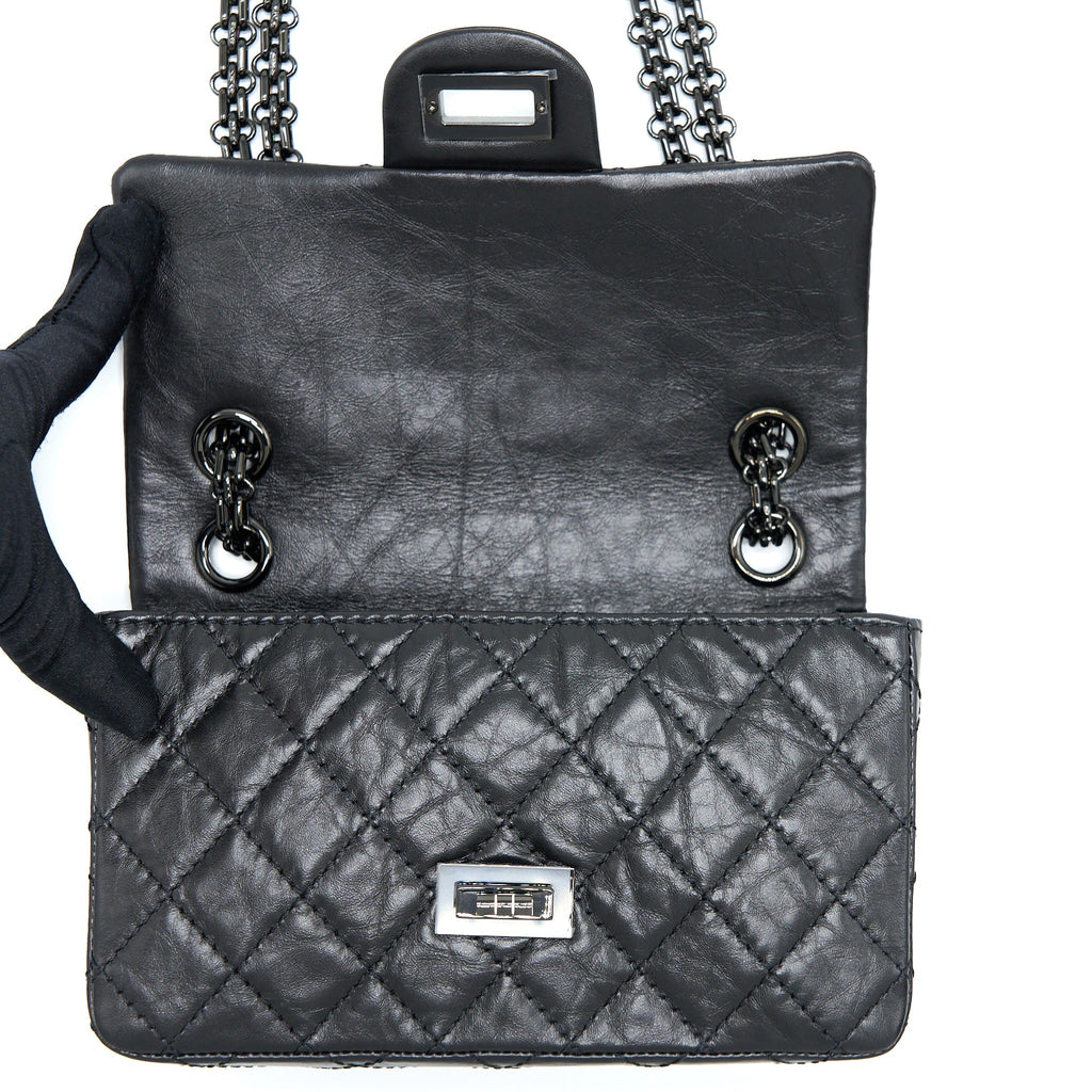 CHANEL MINI 2.55 REISSUE AGED CALFSKIN SO BLACK WITH BLACK HARDWARE (MICROCHIP)