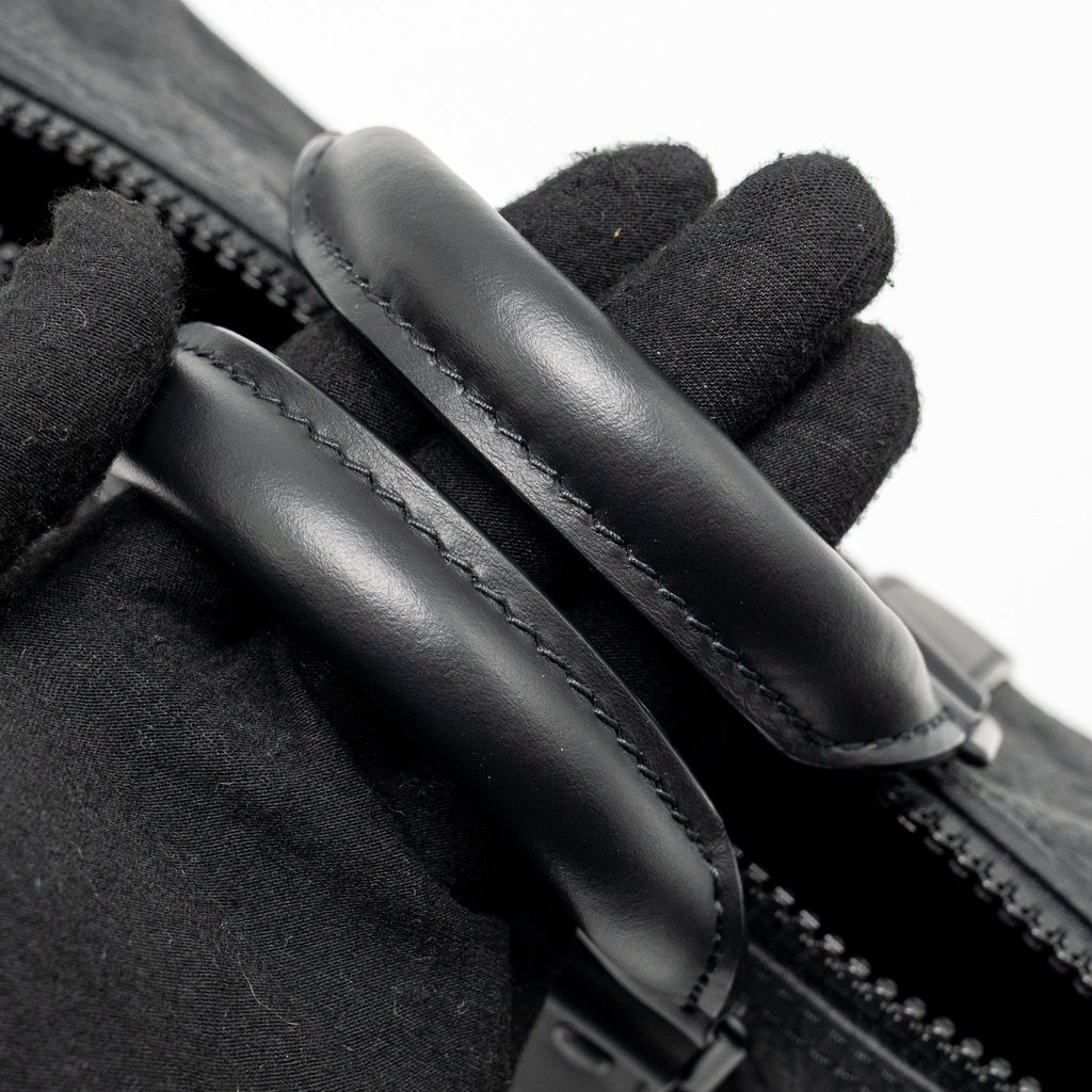 LOUIS VUITTON KEEPALL BANDOULIERE 25 MONOGRAM TAURILLON LEATHER BLACK WITH BLACK HARDWARE