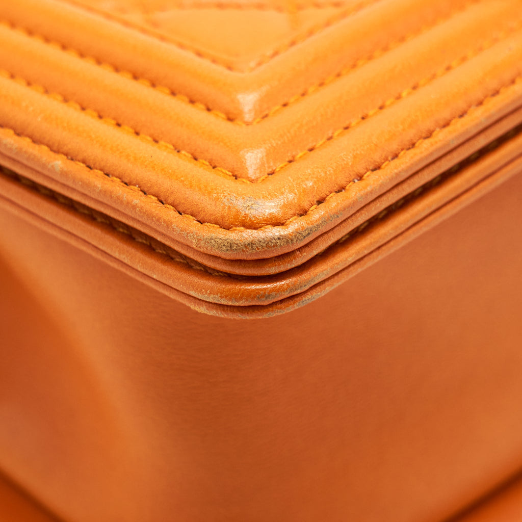 CHANEL SMALL BOY BAG LAMBSKIN ORANGE RUTHENIUM HARDWARE