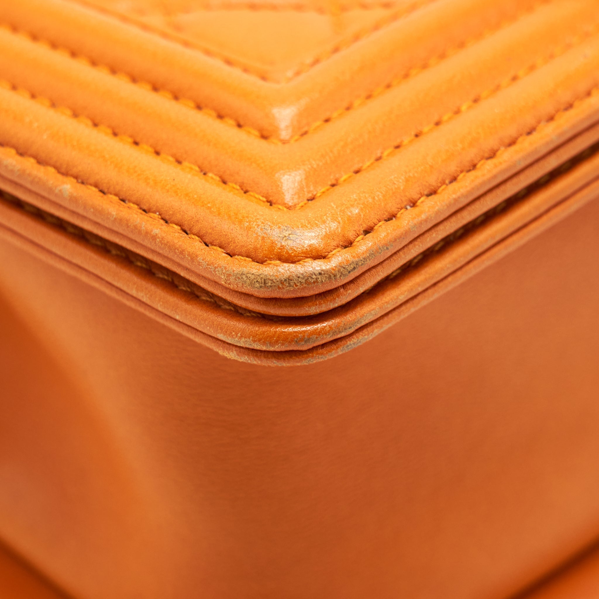 CHANEL SMALL BOY BAG LAMBSKIN ORANGE RUTHENIUM HARDWARE