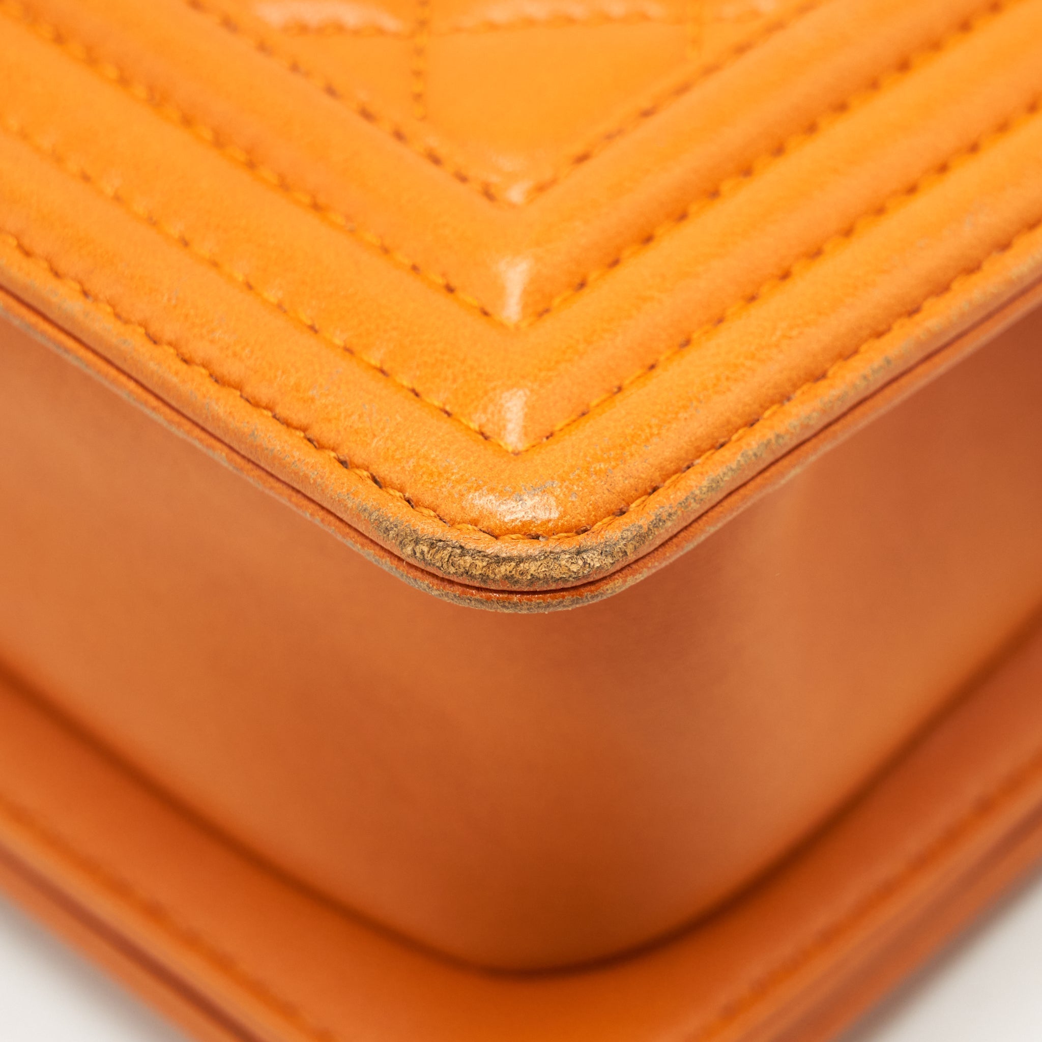 CHANEL SMALL BOY BAG LAMBSKIN ORANGE RUTHENIUM HARDWARE