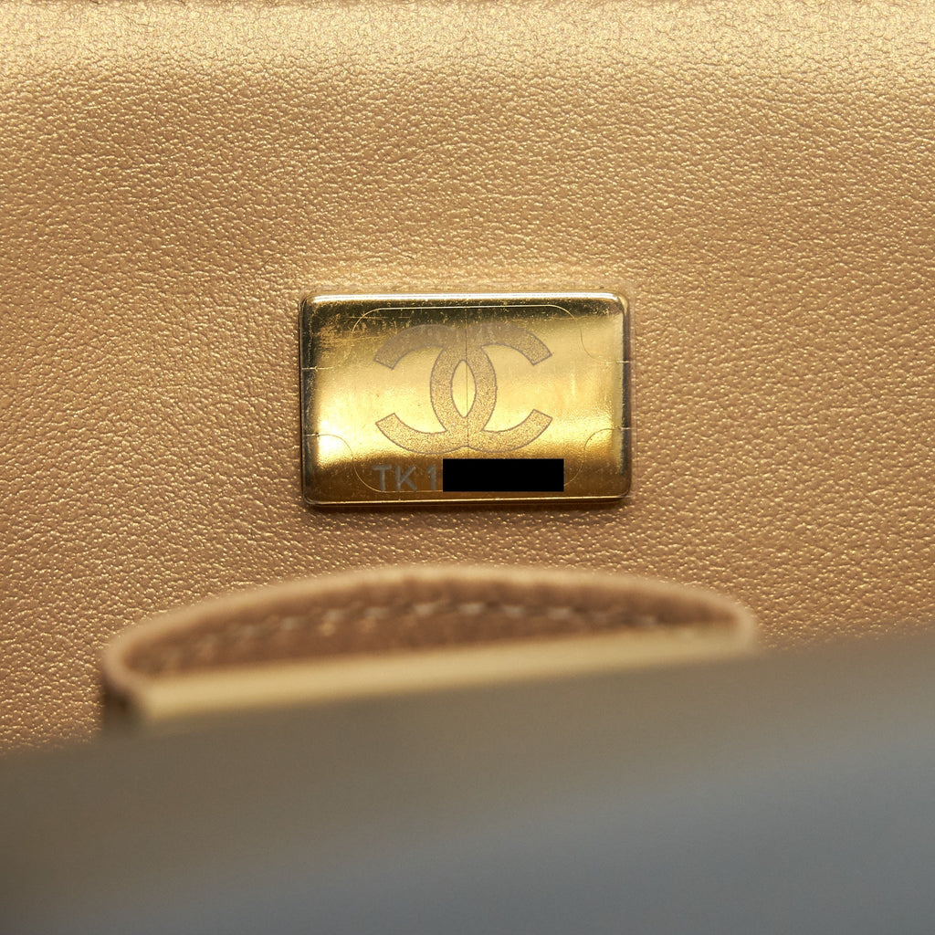 CHANEL 21K GOLD METAL MINI FLAP BAG WITH HANDLE BLACK GHW