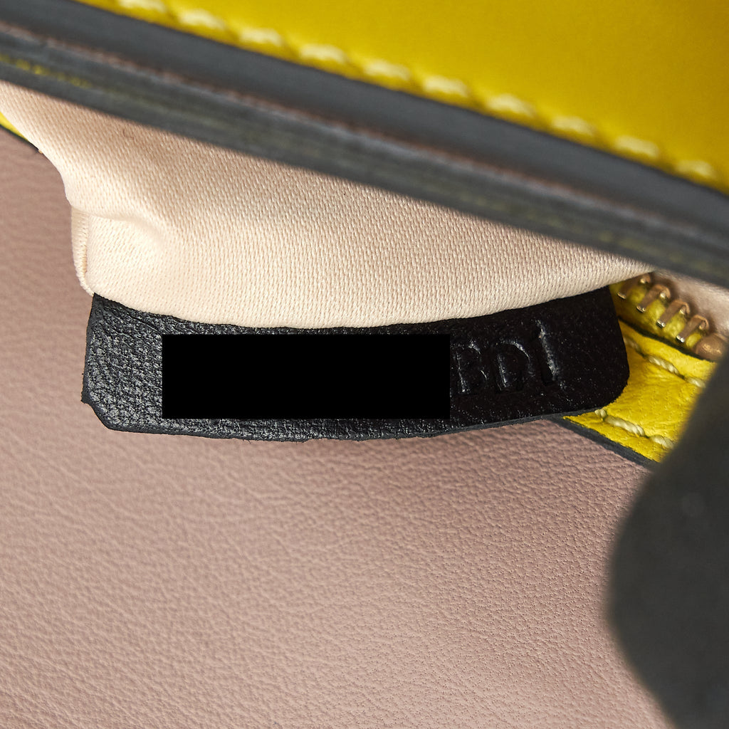 VALENTINO ROCKSTUD CLUTCH BAG YELLOW GHW
