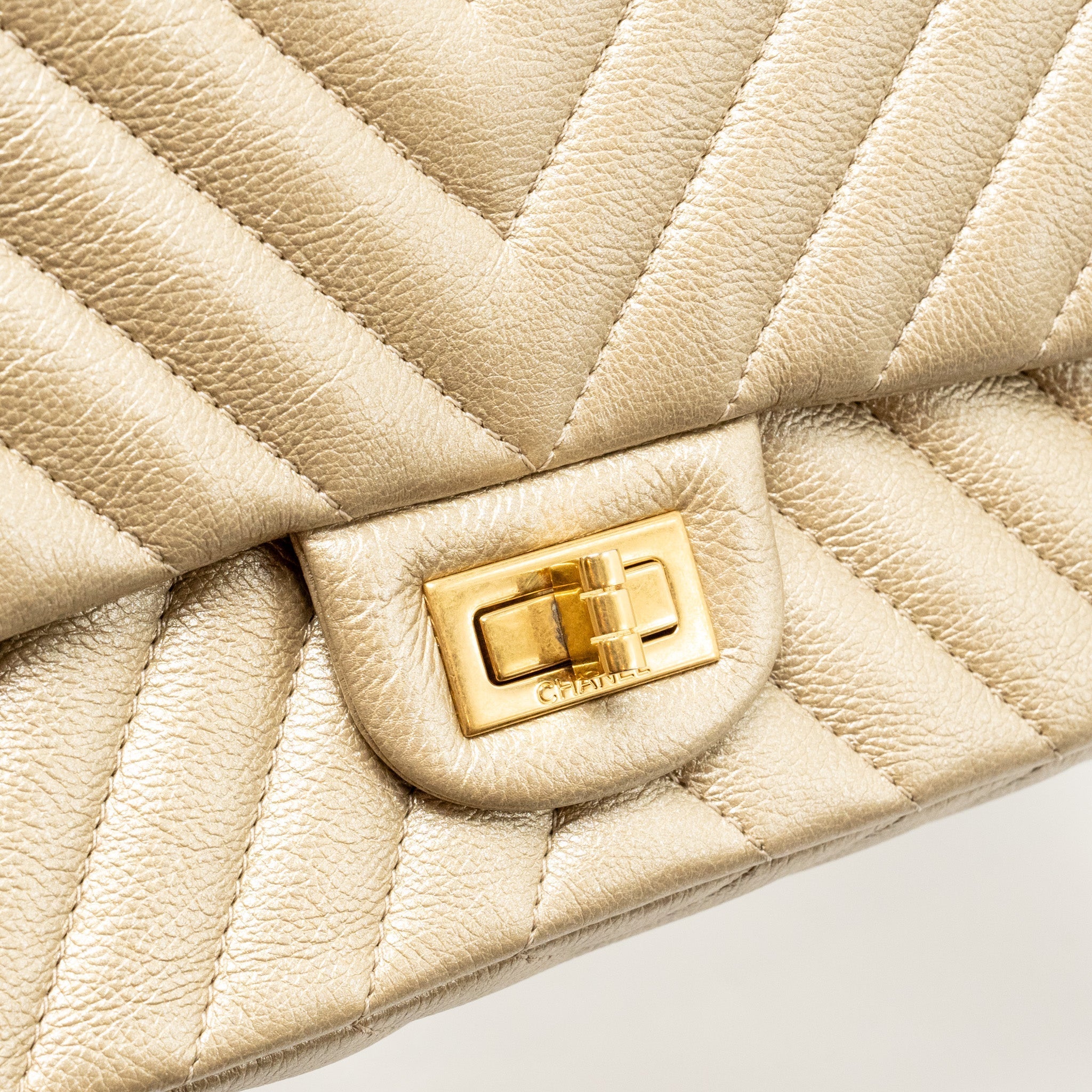 CHANEL SMALL 2.55 REISSUE CHEVRON FLAP BAG CALFSKIN GOLD GHW