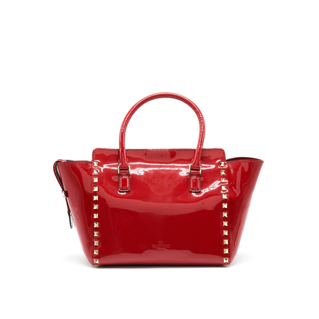 VALENTINO ROCKSTUD SMALL PAGOTA TOTE IN PATENT RED