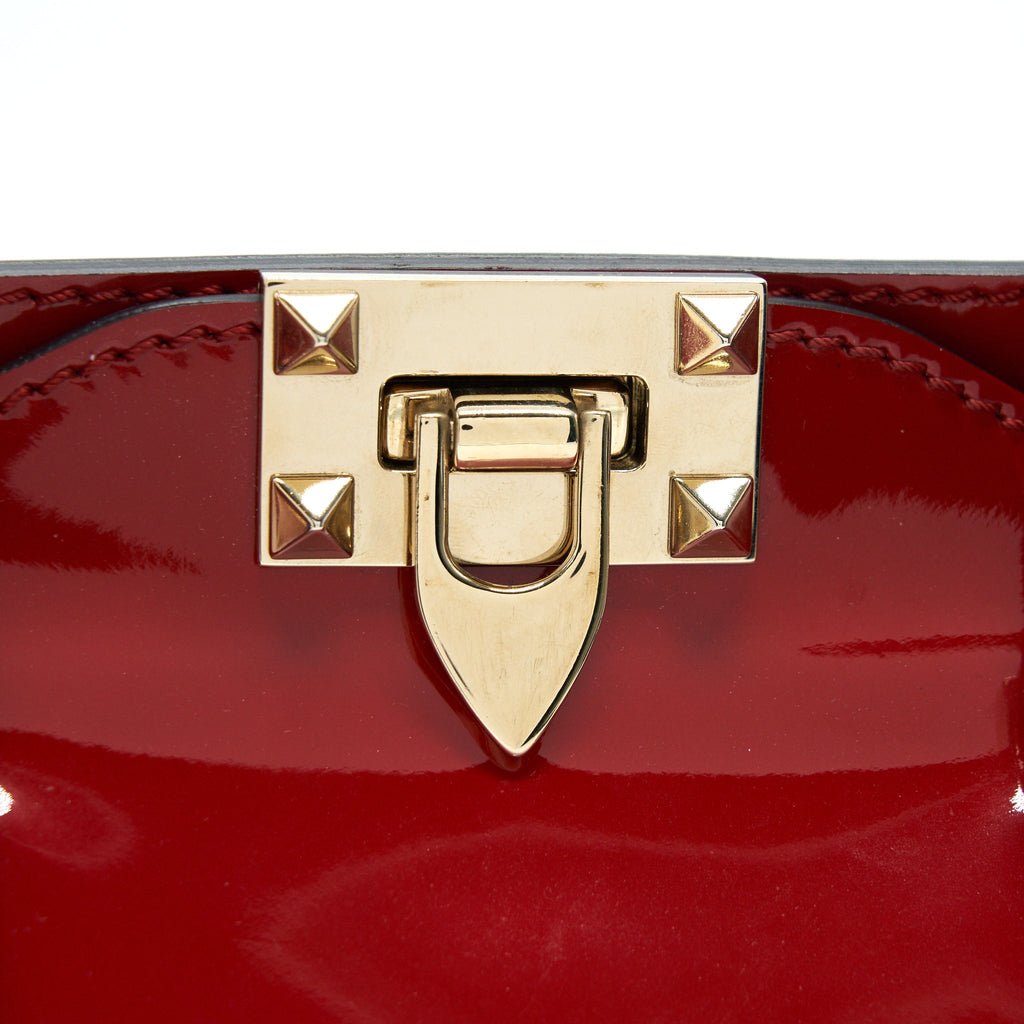 VALENTINO ROCKSTUD SMALL PAGOTA TOTE IN PATENT RED