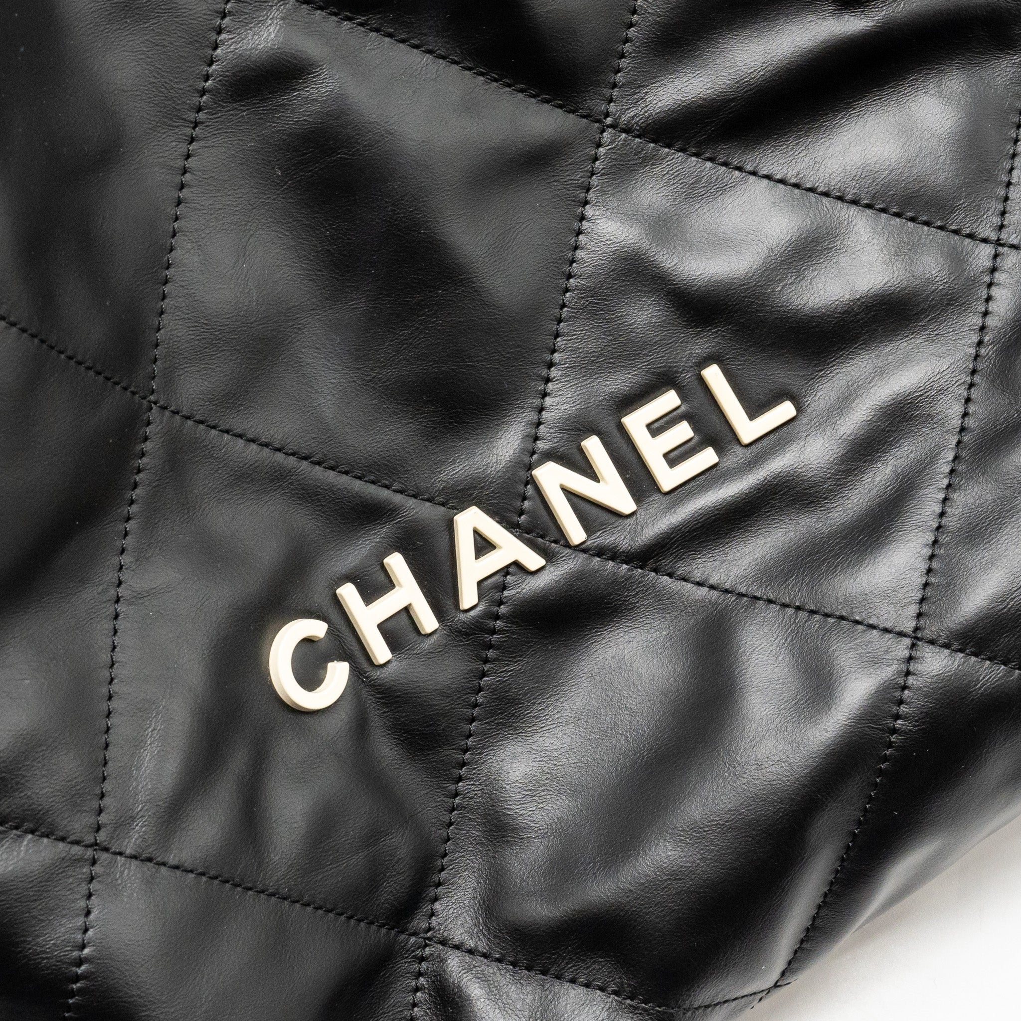 CHANEL 22 BACKPACK WHITE LETTER LOGO SHINY CALFSKIN BLACK GHW (MICROCHIP)