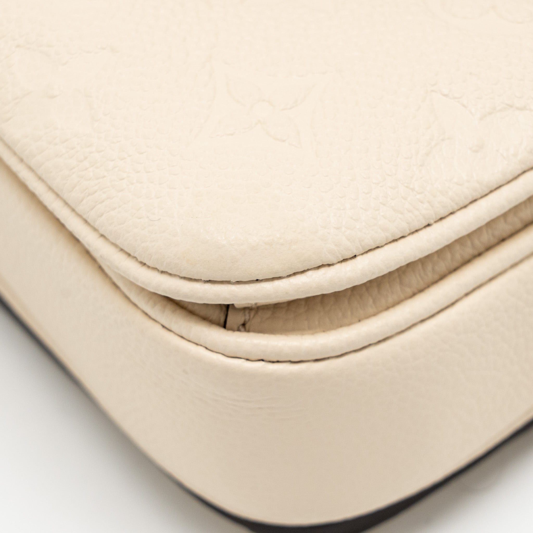LOUIS VUITTON POCHETTE MÉTIS EAST WEST MONOGRAM EMPREINTE LEATHER CREAM GHW
