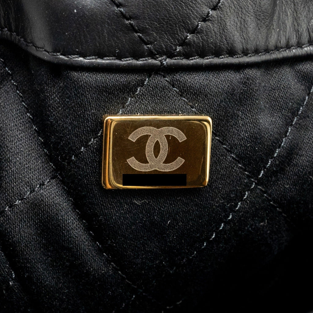 CHANEL 22 BACKPACK WHITE LETTER LOGO SHINY CALFSKIN BLACK GHW (MICROCHIP)