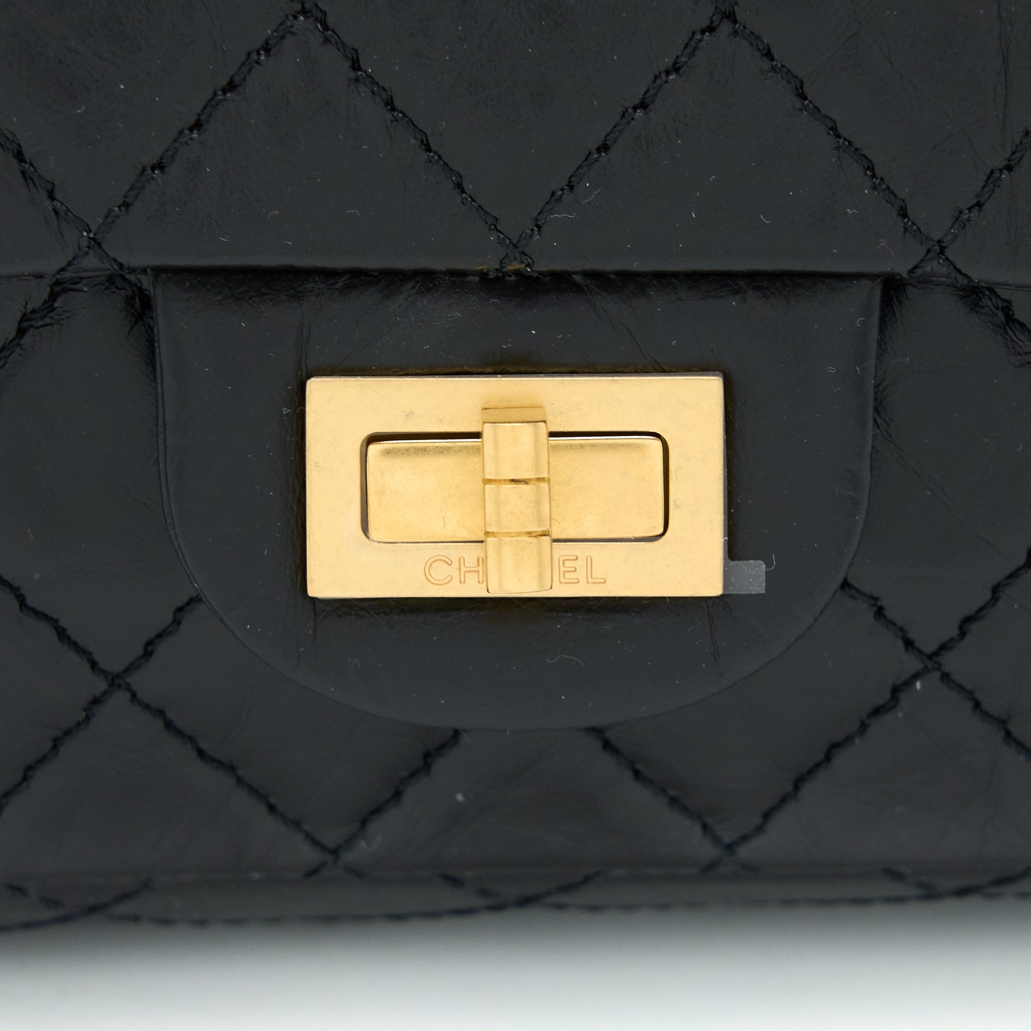 CHANEL MINI 2.55 REISSUE FLAP BAG AGED CALFSKIN BLACK BRUSHED GHW (MICROCHIP)