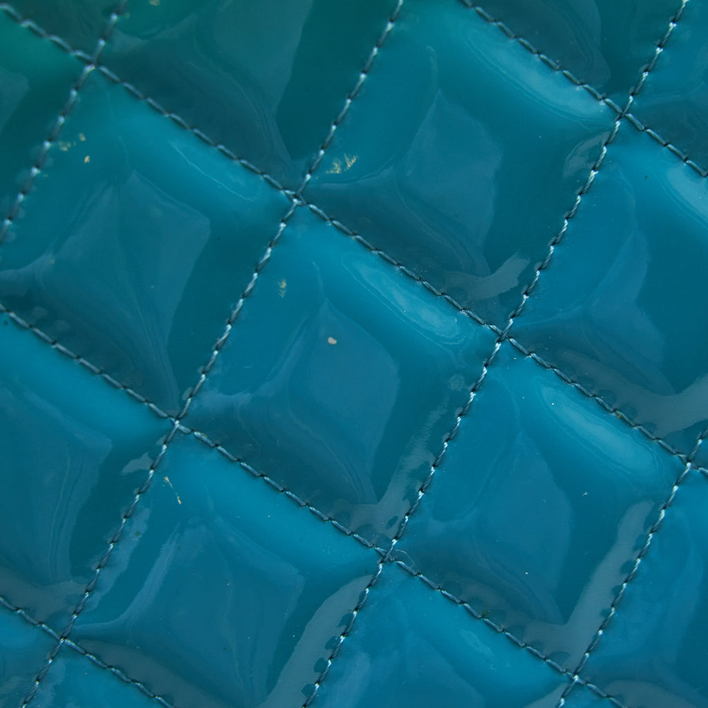CHANEL QUILTED LEATHER CLUTCH BAG IN PATENT BLUE