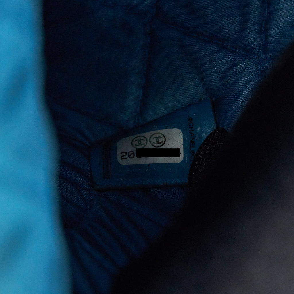 CHANEL QUILTED LEATHER CLUTCH BAG IN PATENT BLUE