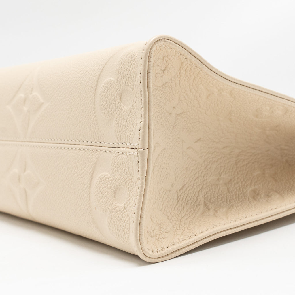 LOUIS VUITTON ONTHEGO PM MONOGRAM EMPREINTE LEATHER CREME GHW