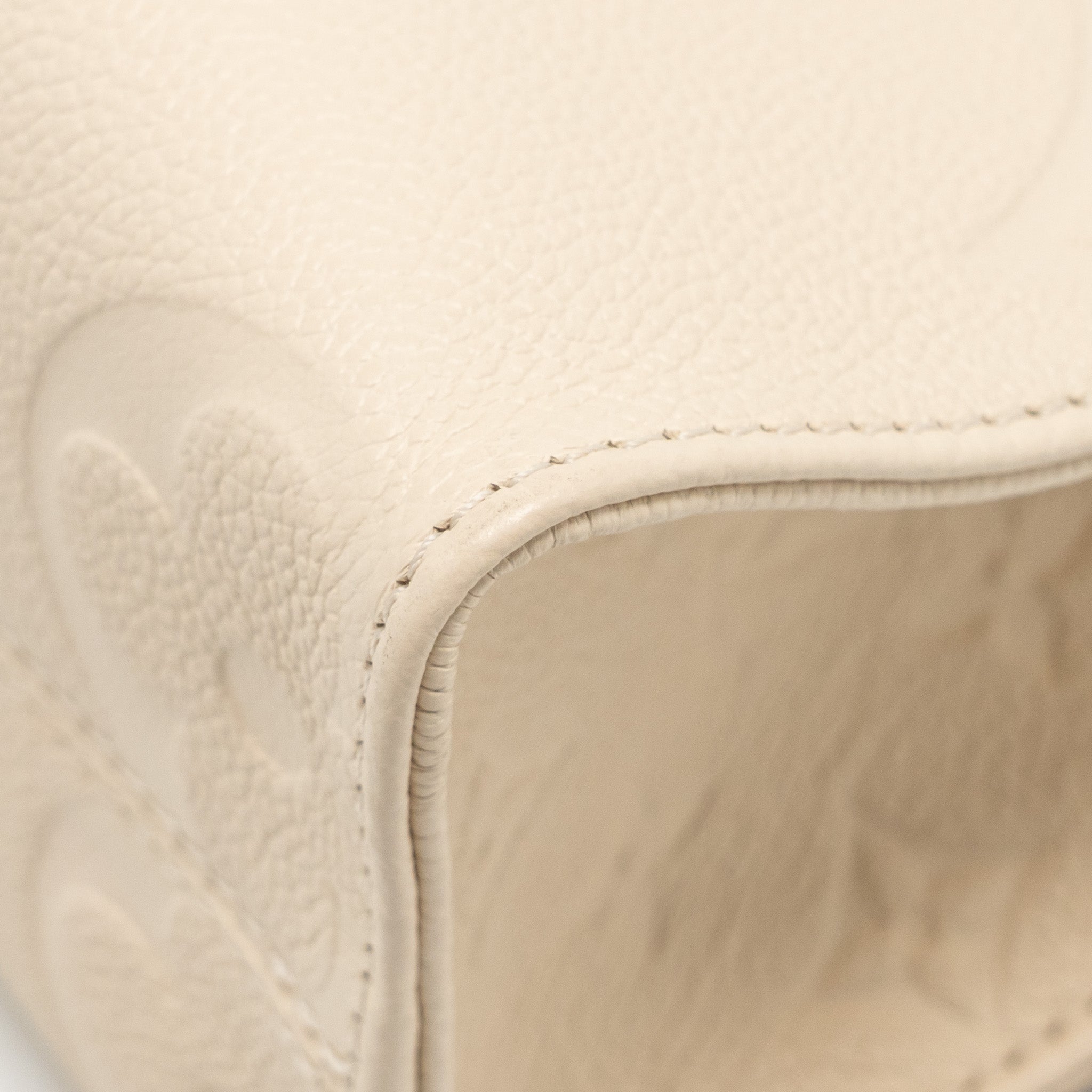 LOUIS VUITTON ONTHEGO PM MONOGRAM EMPREINTE LEATHER CREME GHW