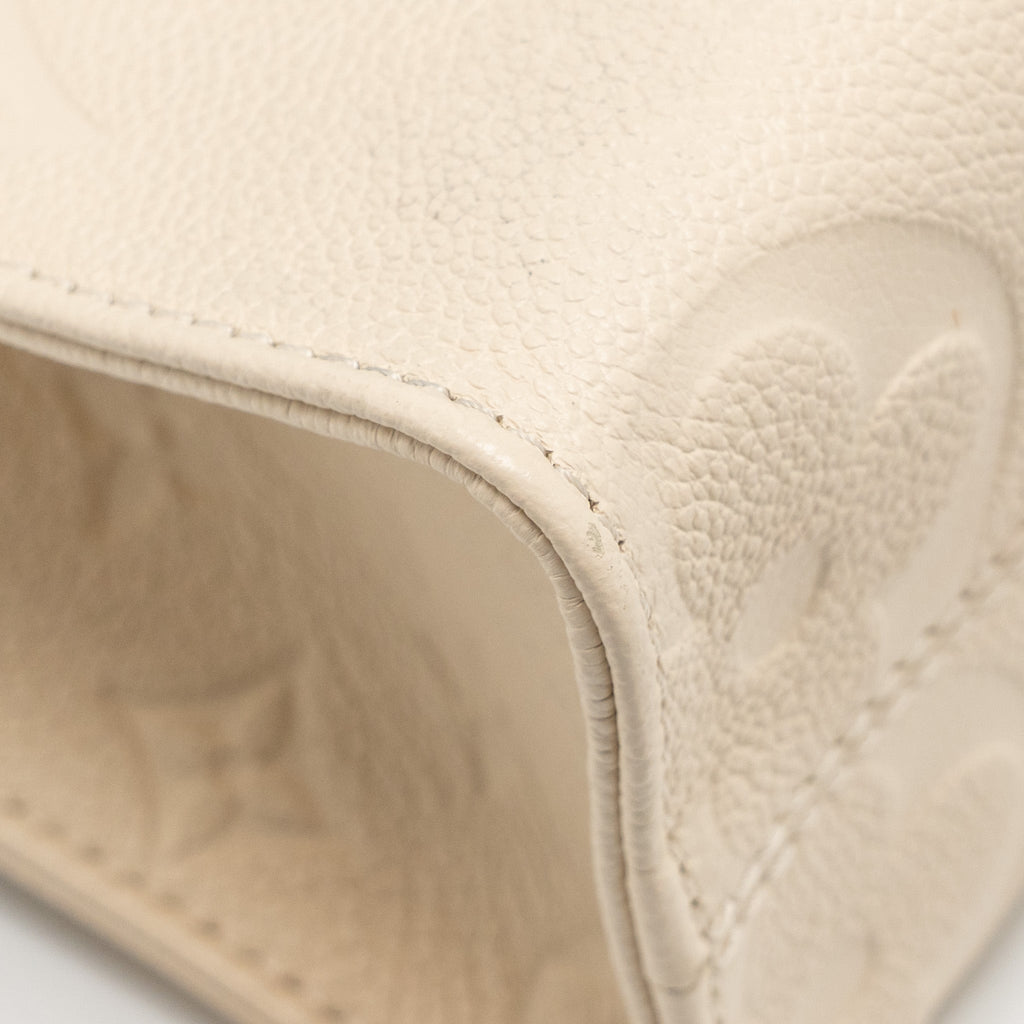 LOUIS VUITTON ONTHEGO PM MONOGRAM EMPREINTE LEATHER CREME GHW