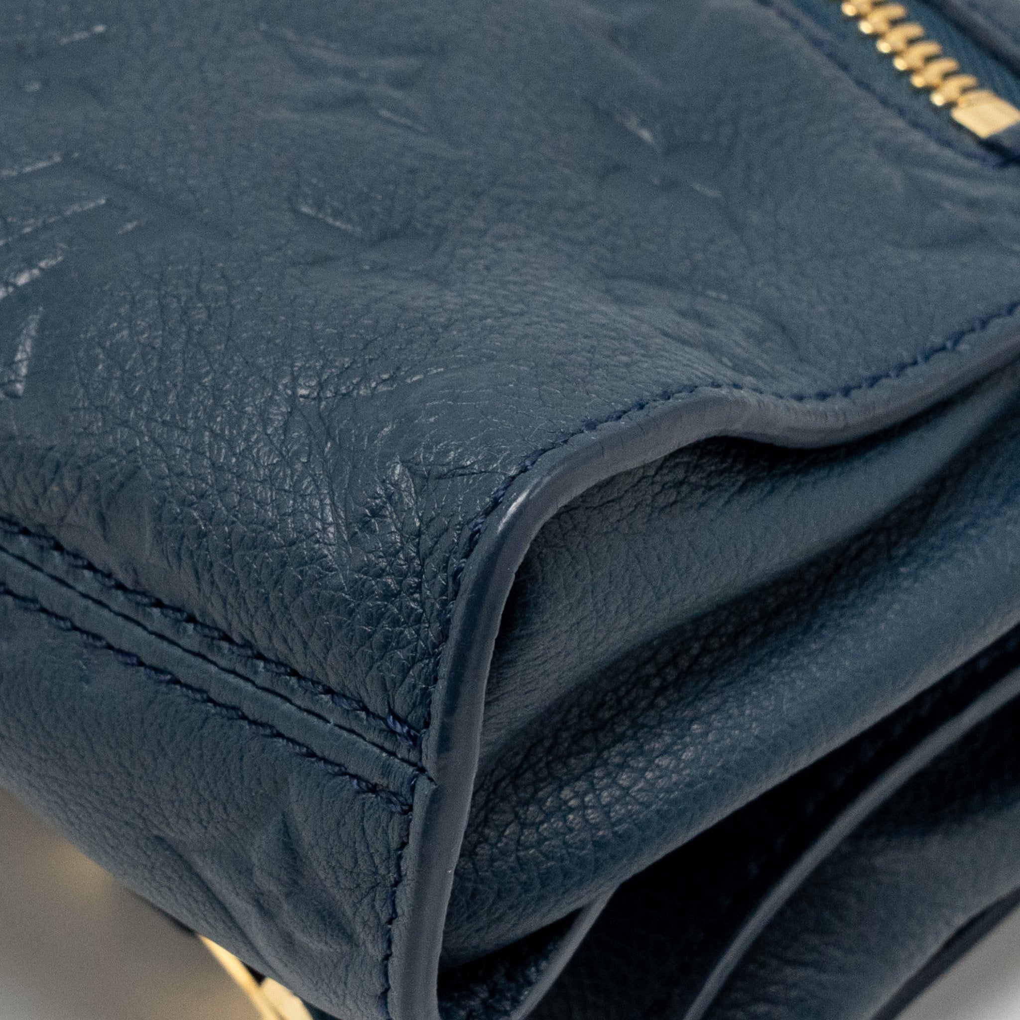 LOUIS VUITTON PETILLANTE CLUTCH MONOGRAM EMPREINTE LEATHER DARK BLUE GHW