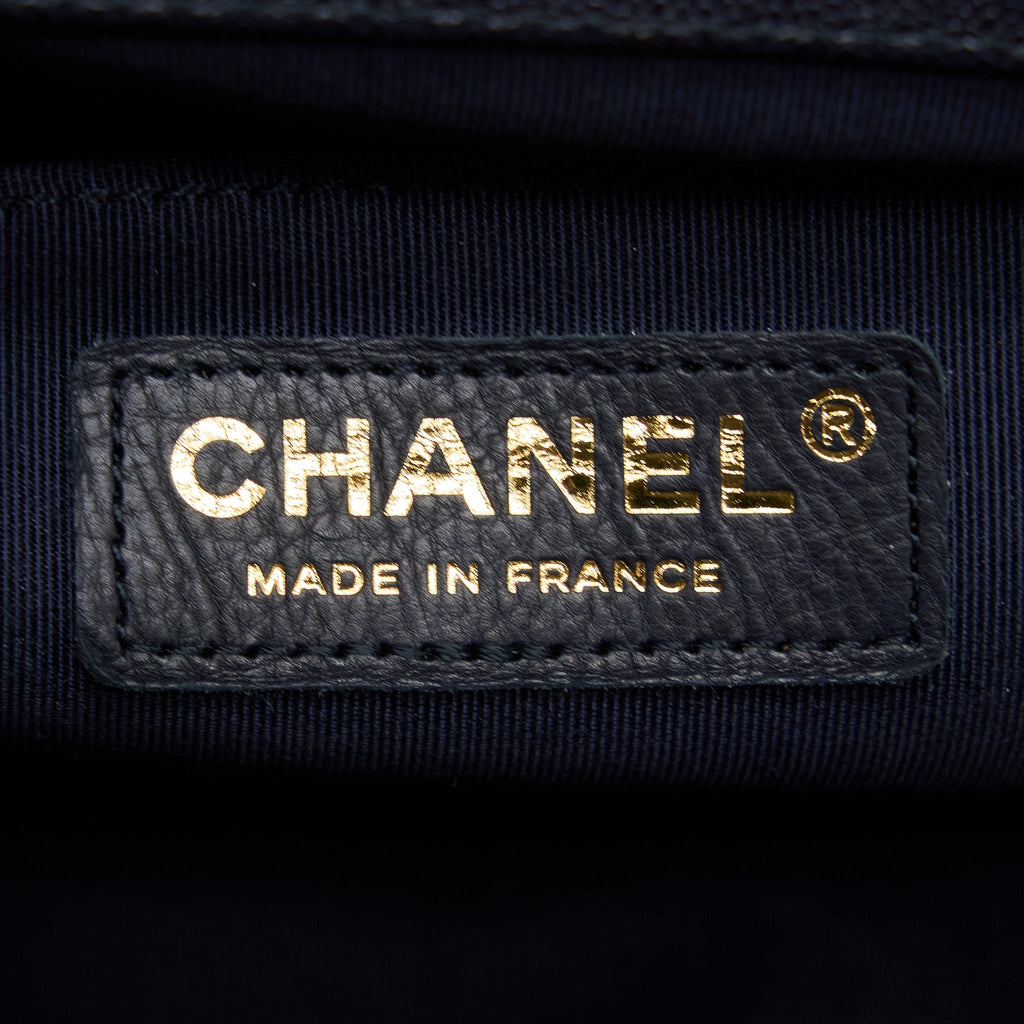 CHANEL MEDIUM BOY BAG GRAINED CALFSKIN DARK BLUE LGHW