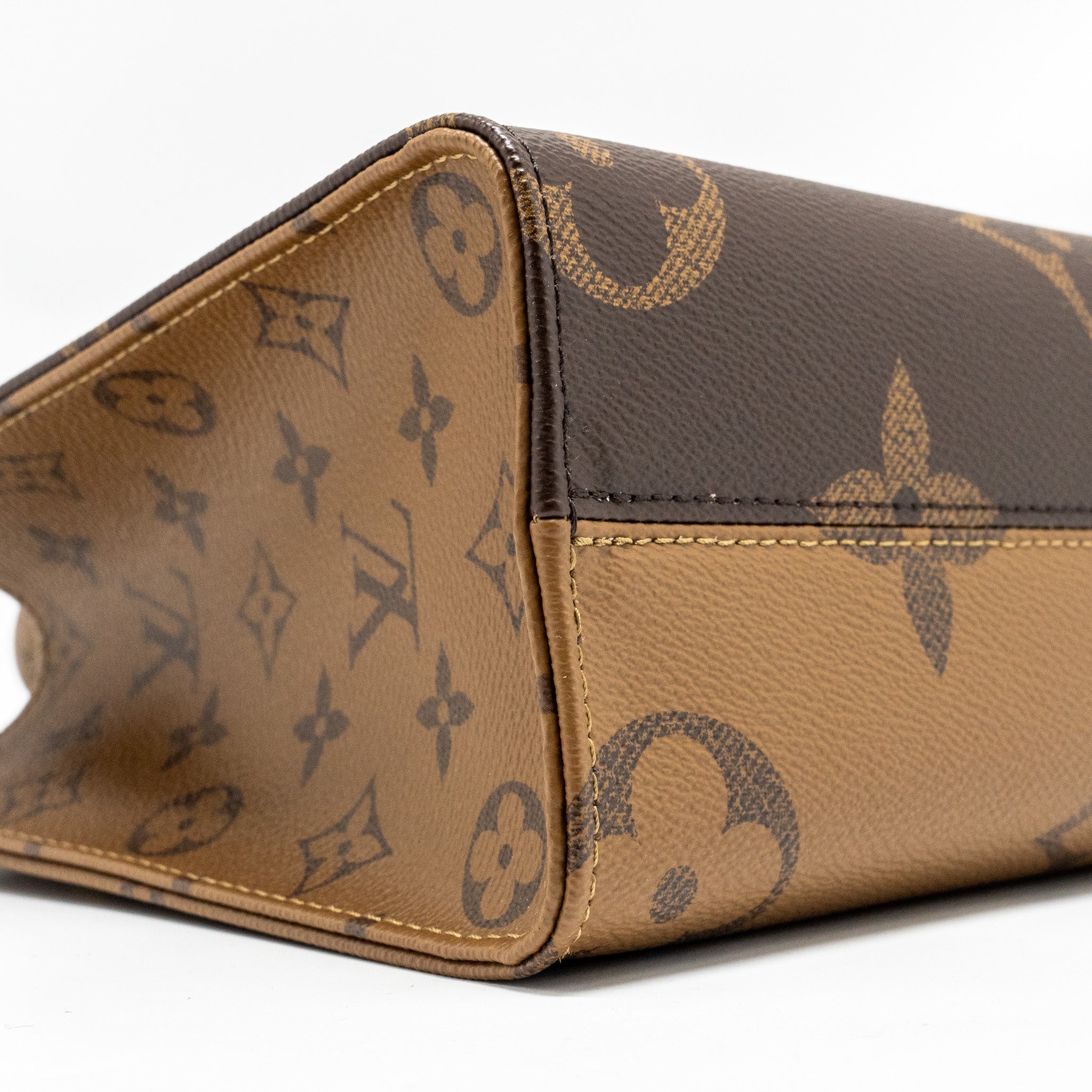 LOUIS VUITTON ONTHEGO PM MONOGRAM REVERSE CANVAS GHW