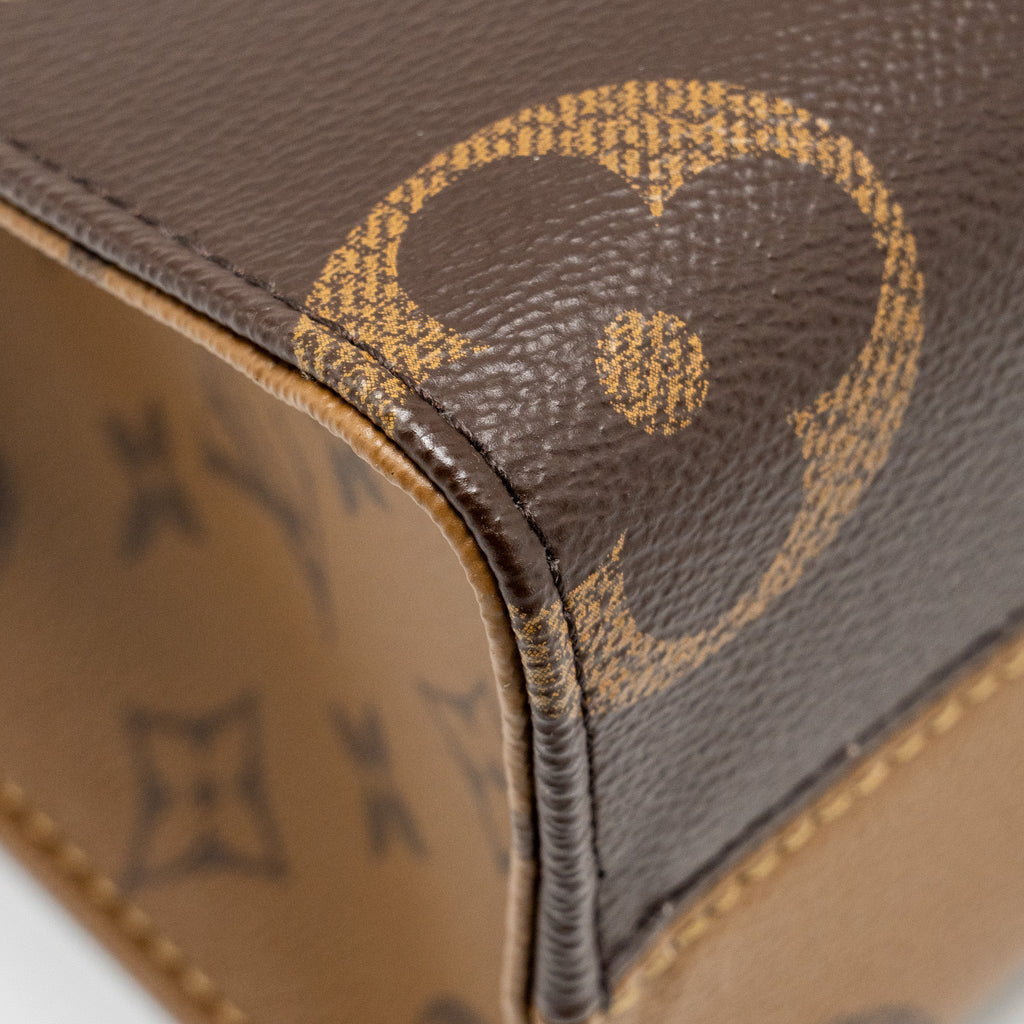LOUIS VUITTON ONTHEGO PM MONOGRAM REVERSE CANVAS GHW