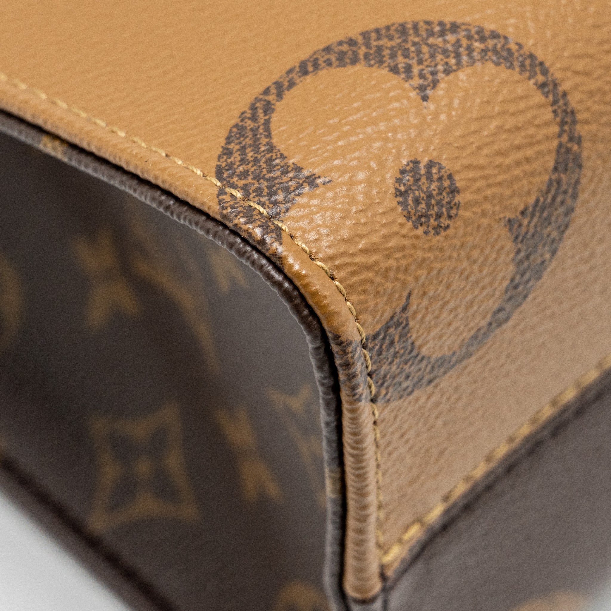 LOUIS VUITTON ONTHEGO PM MONOGRAM REVERSE CANVAS GHW