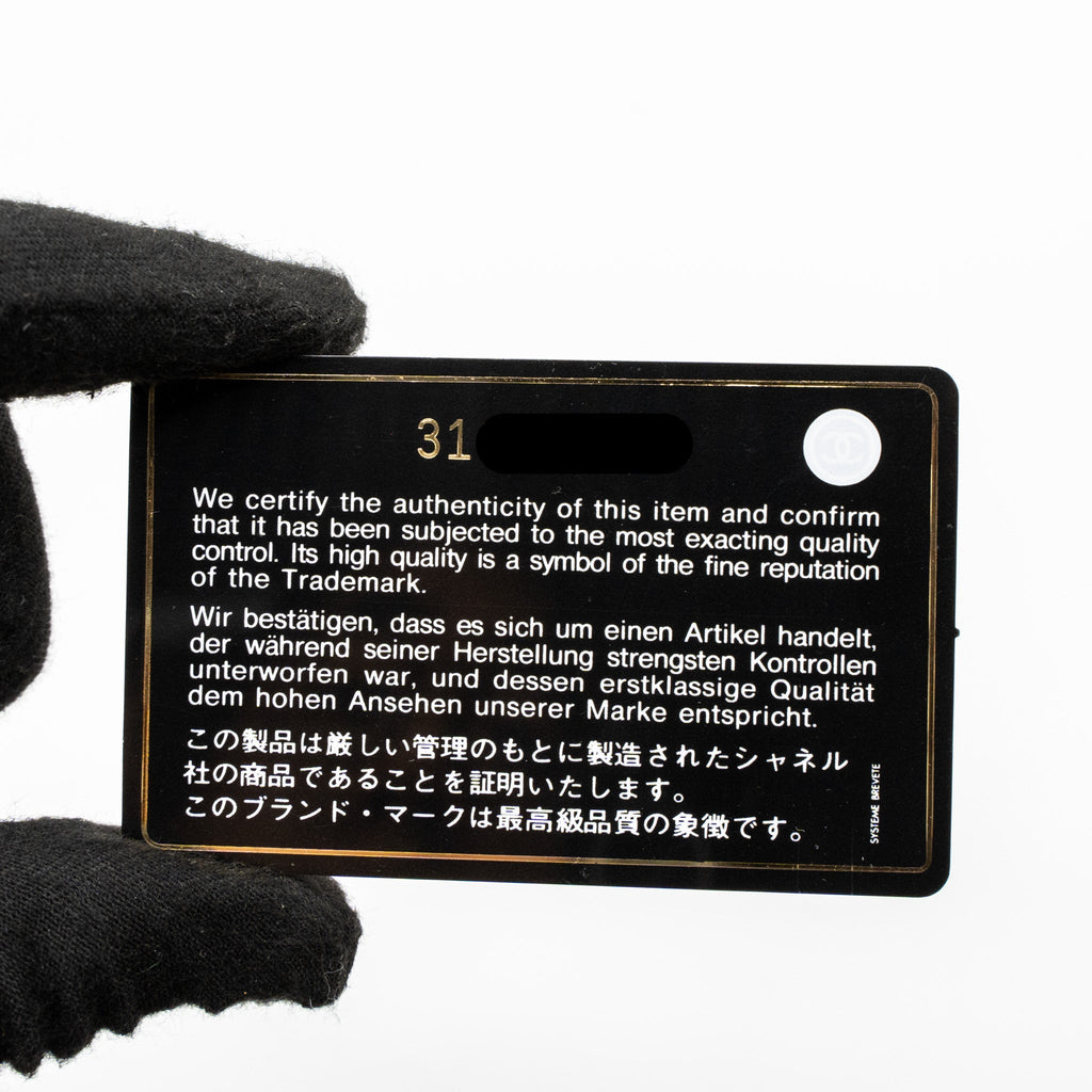 CHANEL VERTICAL PHONE POUCH CAVIAR BLACK LGHW