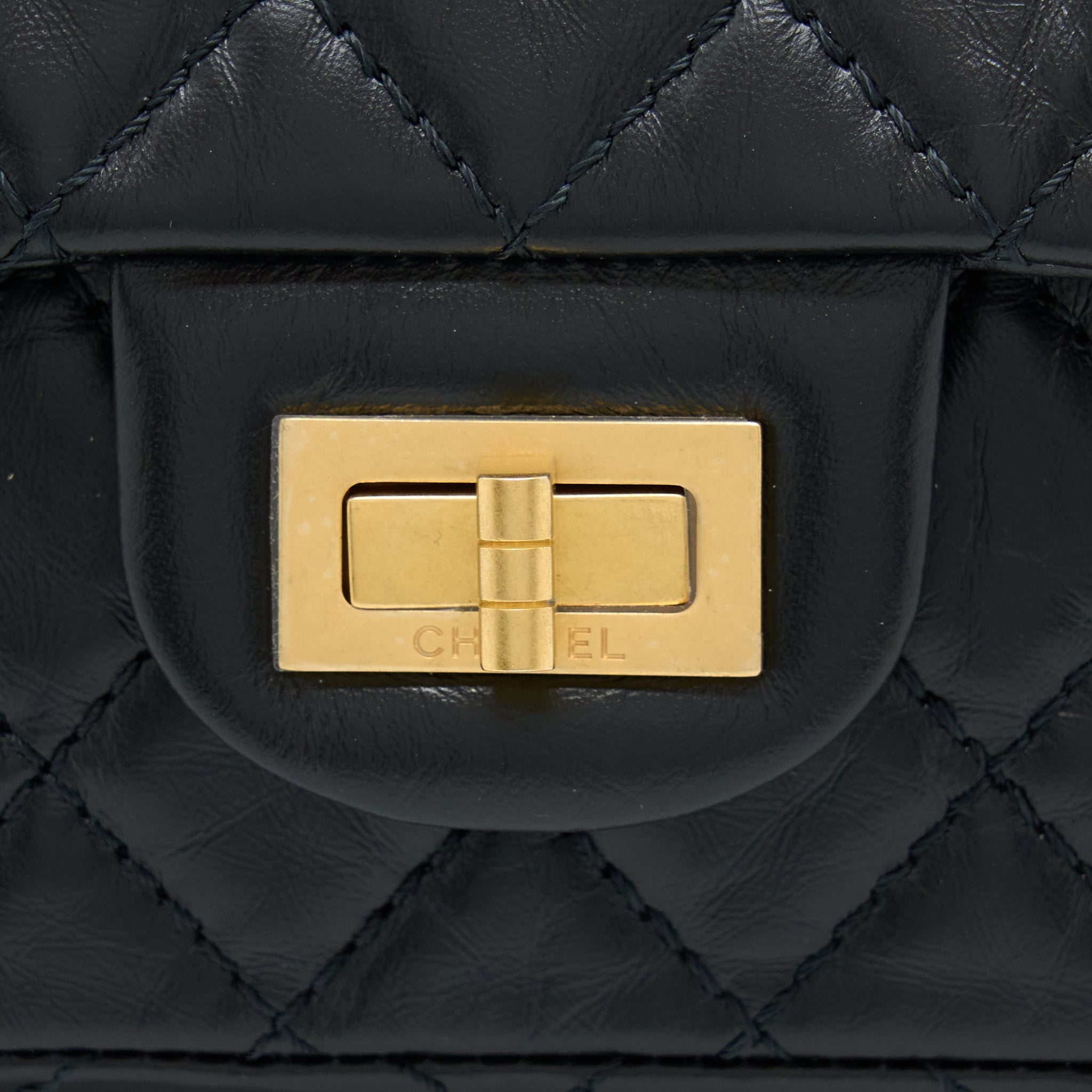 CHANEL MINI 2.55 REISSUE FLAP BAG AGED CALFSKIN BLACK BRUSHED GHW (MICROCHIP)