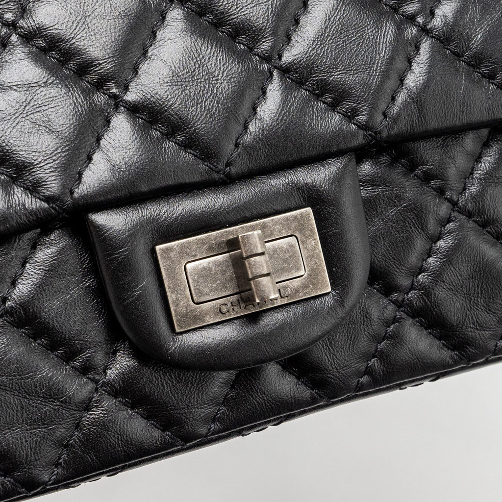 CHANEL MINI 2.55 REISSUE FLAP BAG AGED CALFSKIN BLACK RUTHENIUM HARDWARE