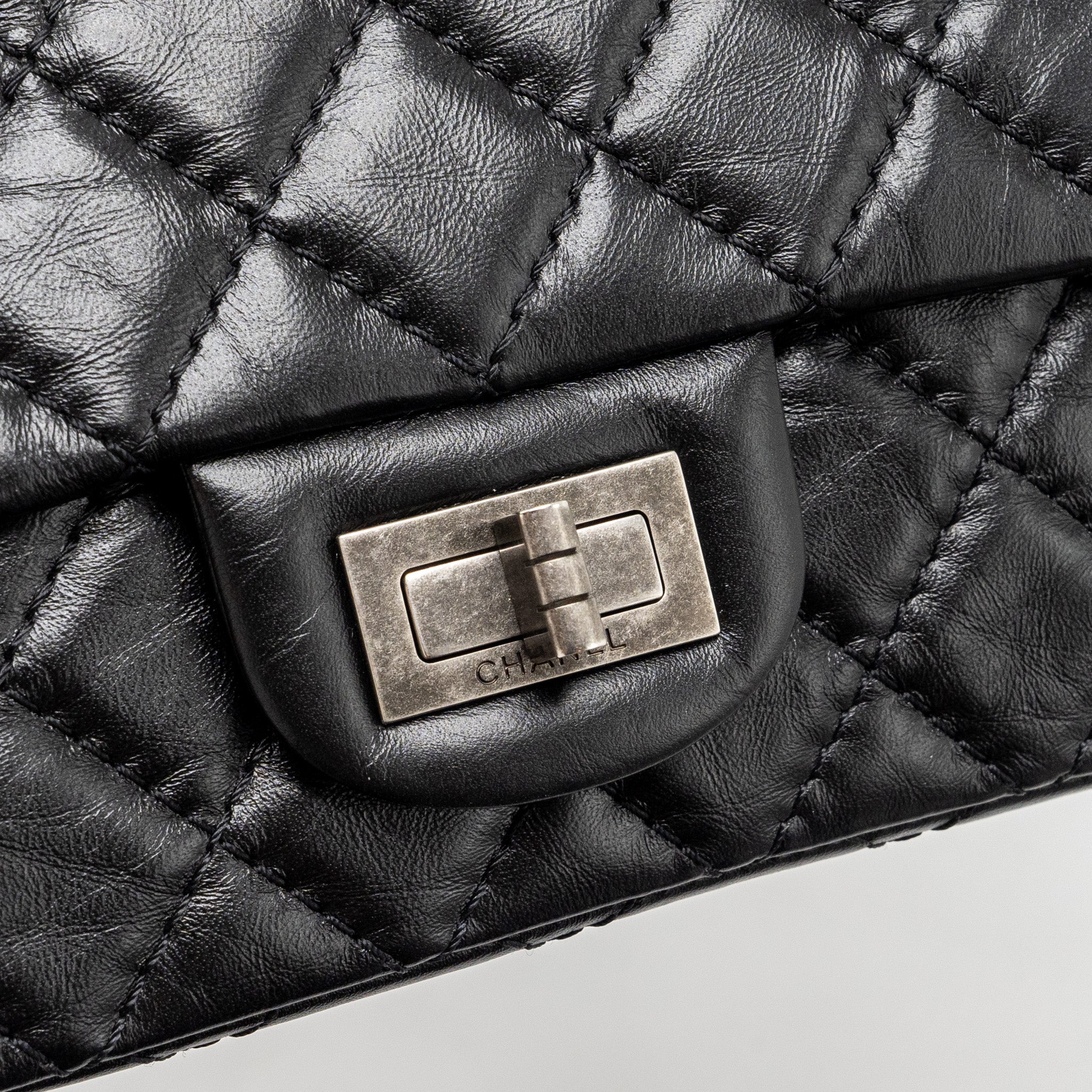 CHANEL MINI 2.55 REISSUE FLAP BAG AGED CALFSKIN BLACK RUTHENIUM HARDWARE