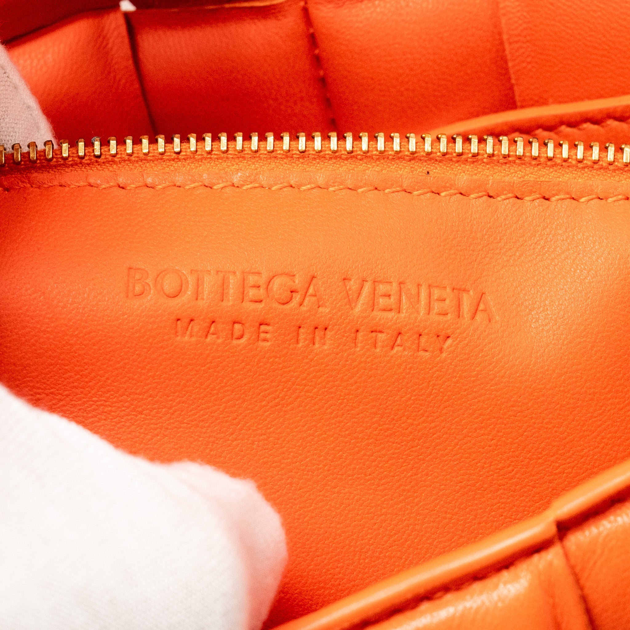 BOTTEGA VENETA PADDED CASSETTE BAG LAMBSKIN ORANGE GHW