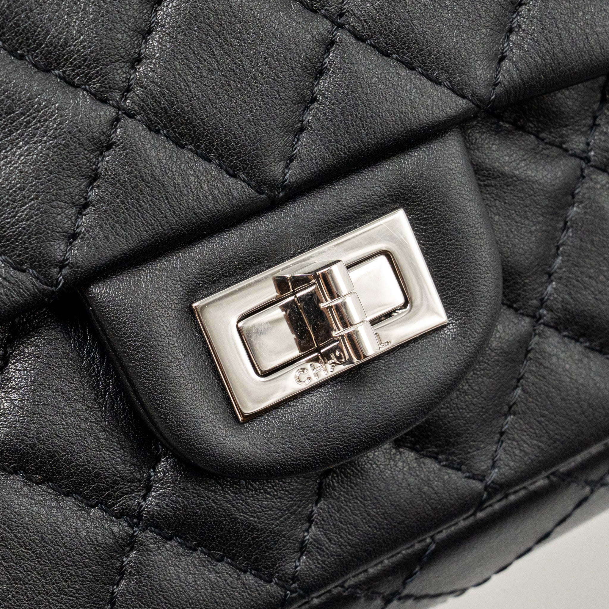 CHANEL MINI 2.55 REISSUE AGED CALFSKIN BLACK SHW (MICROCHIP)