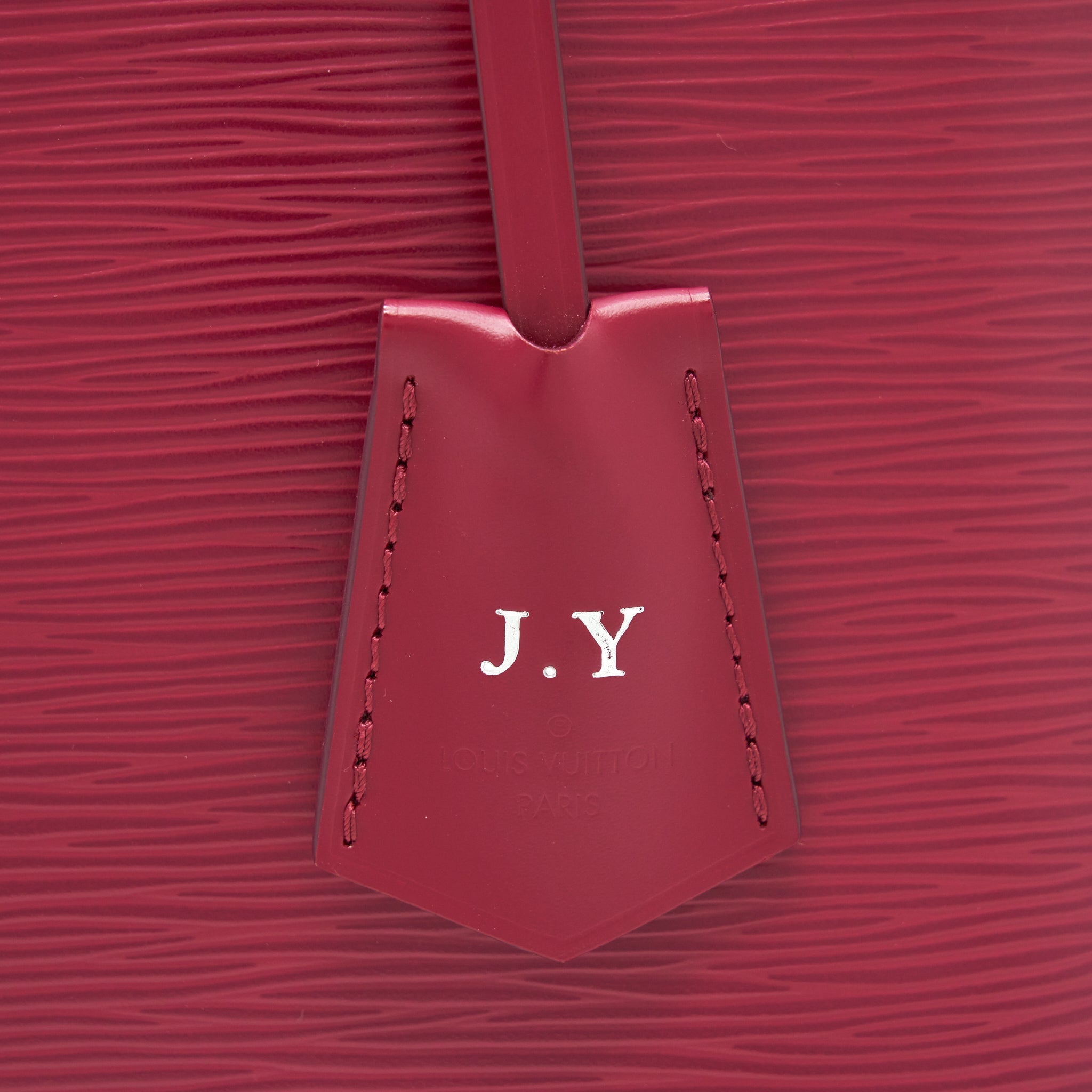 LOUIS VUITTON ALMA PM EPI DARK RED SHW WITH INITIAL J.Y ON KEY TAG