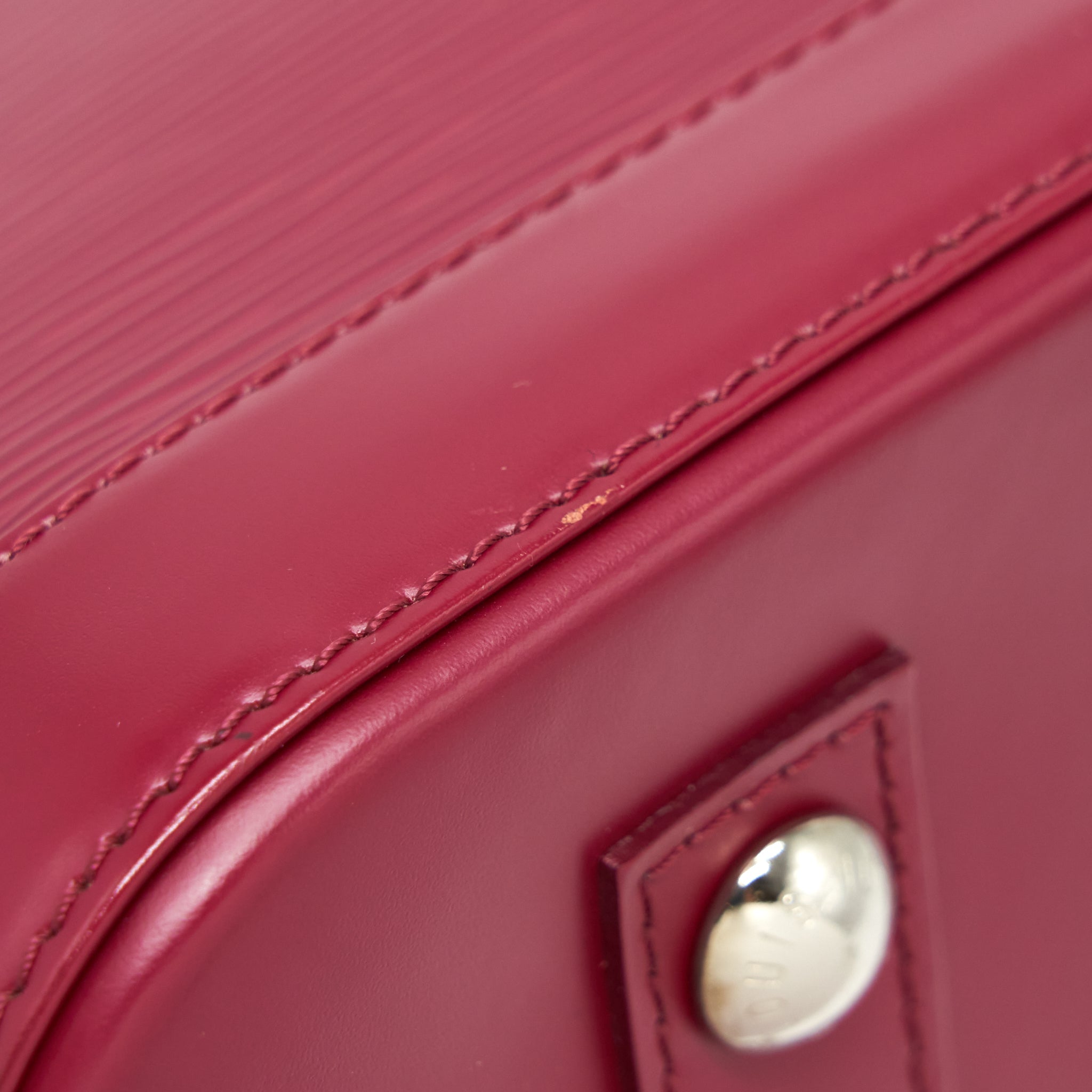 LOUIS VUITTON ALMA PM EPI DARK RED SHW WITH INITIAL J.Y ON KEY TAG