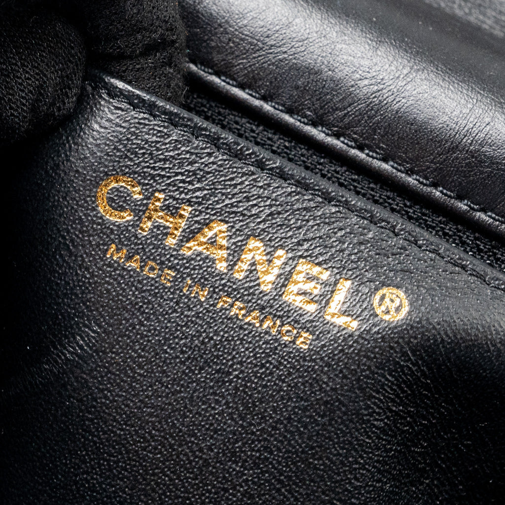 CHANEL MINI 2.55 REISSUE FLAP BAG AGED CALFSKIN BLACK GHW