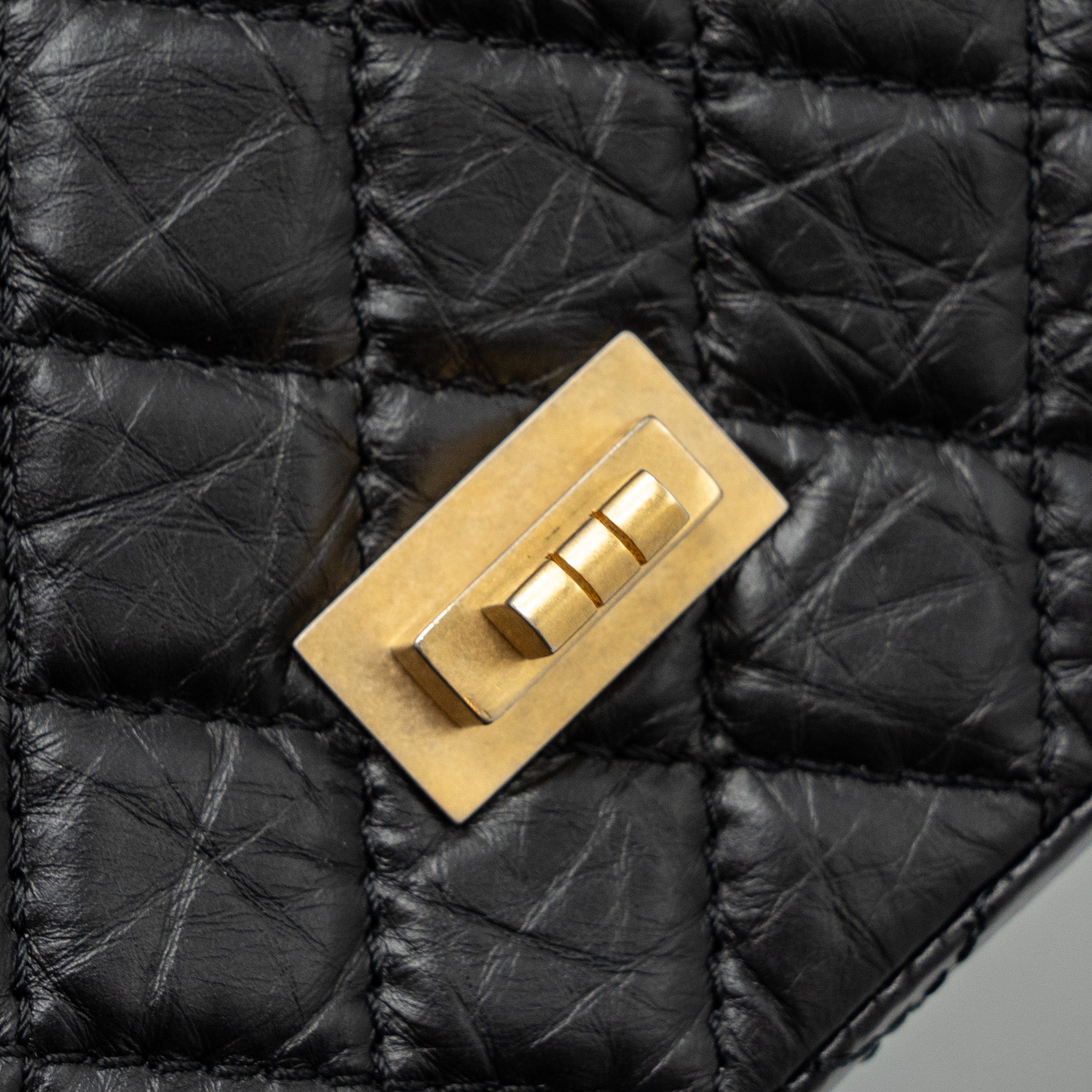 CHANEL MINI 2.55 REISSUE FLAP BAG AGED CALFSKIN BLACK GHW