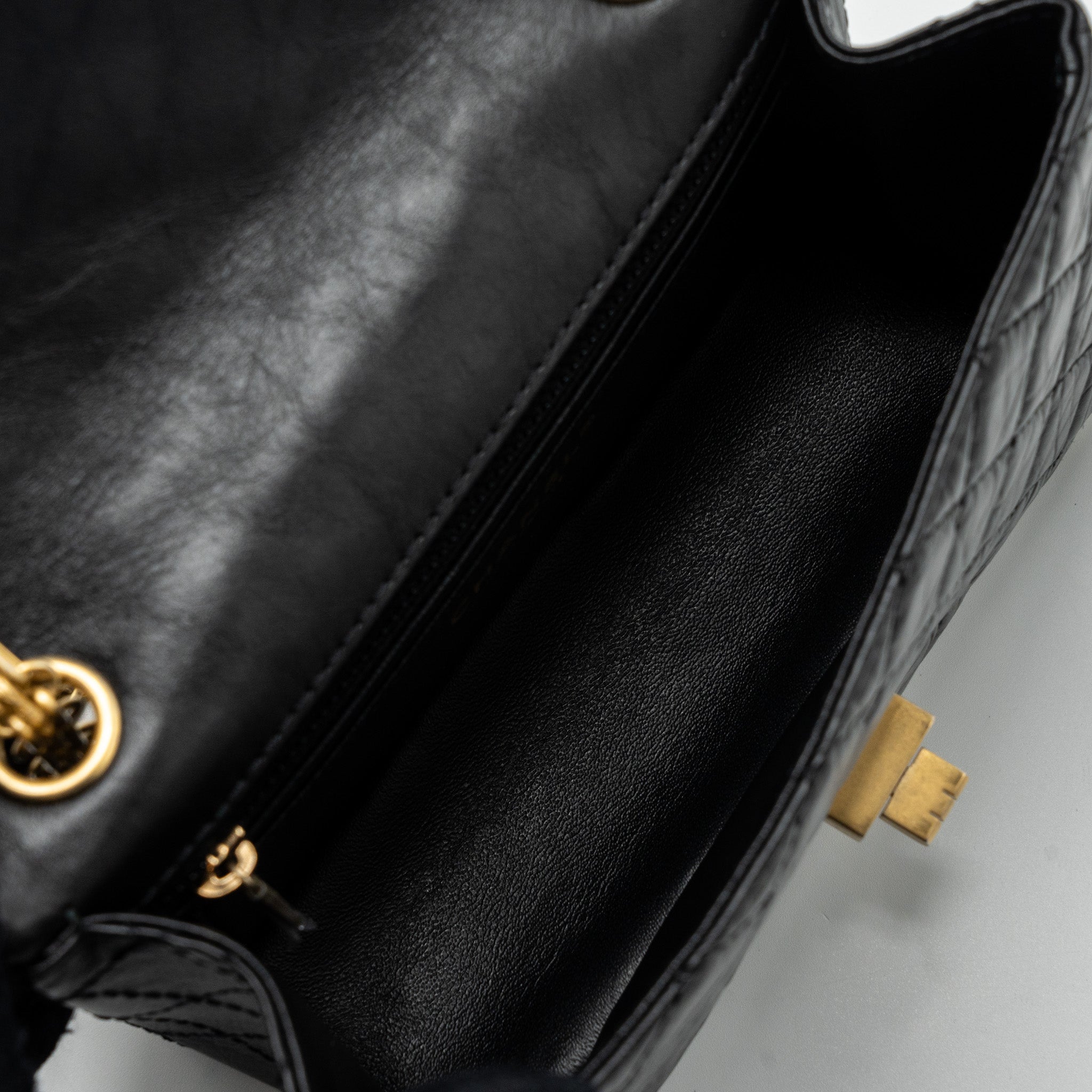 CHANEL MINI 2.55 REISSUE FLAP BAG AGED CALFSKIN BLACK GHW