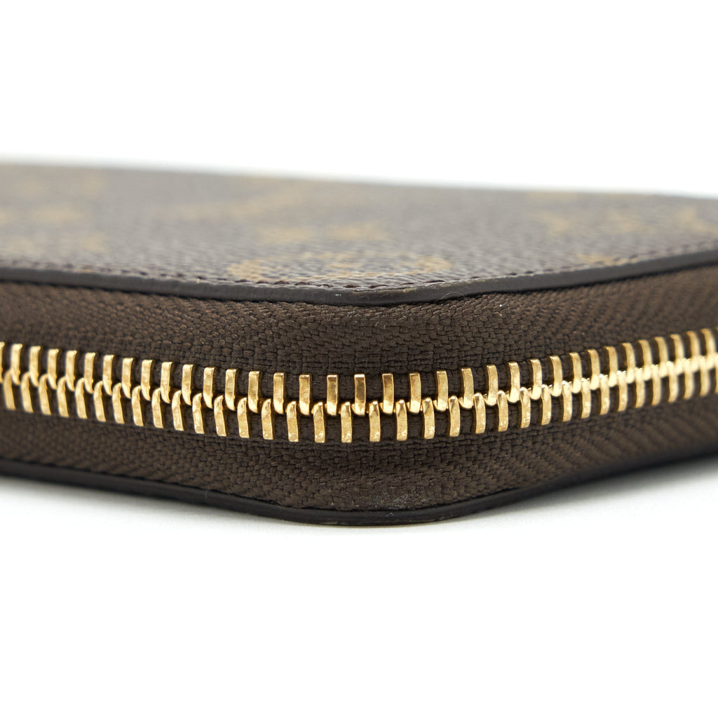 LOUIS VUITTON CLEMENCE LONG WALLET MONOGRAM CANVAS FUCHSIA