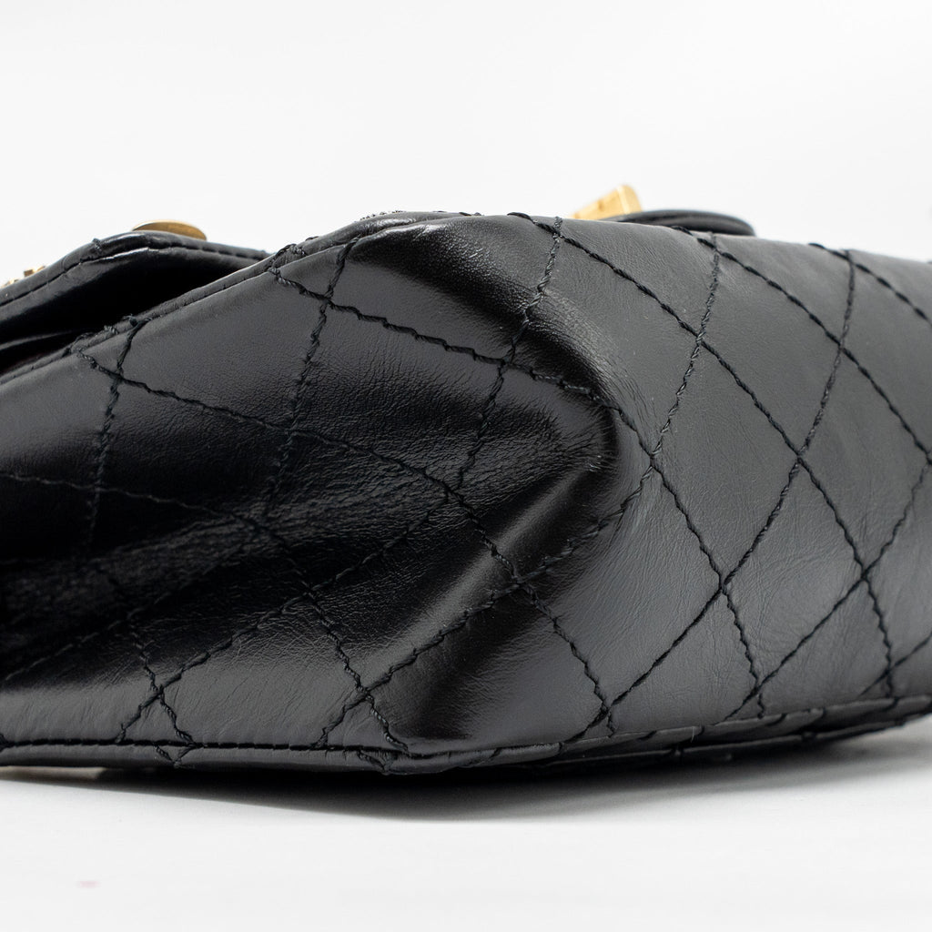 CHANEL MINI 2.55 REISSUE FLAP BAG LUCKY CHARMS AGED CALFSKIN BLACK GHW