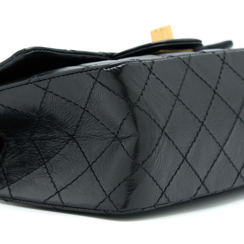 CHANEL MINI 2.55 REISSUE FLAP BAG AGED CALFSKIN BLACK BRUSHED GHW (MICROCHIP)