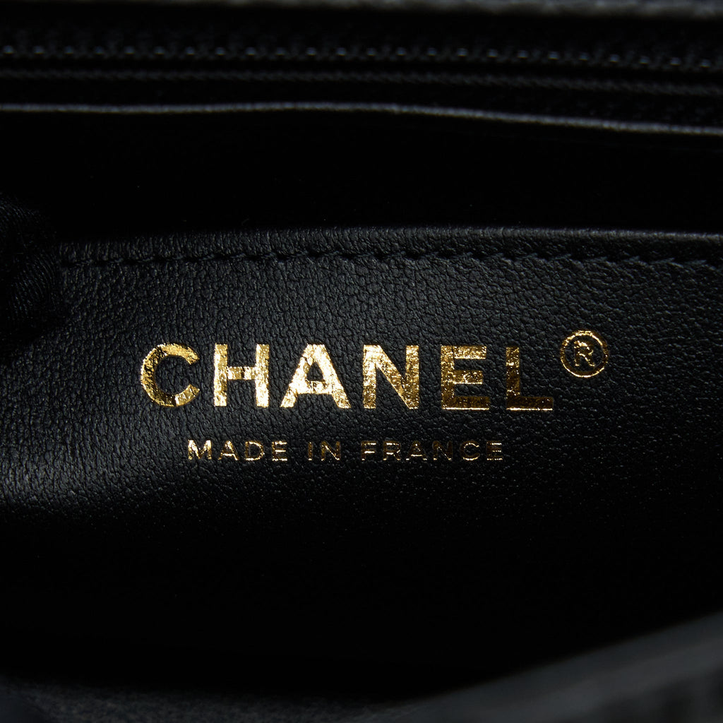 CHANEL MINI 2.55 REISSUE FLAP BAG AGED CALFSKIN BLACK BRUSHED GHW (MICROCHIP)