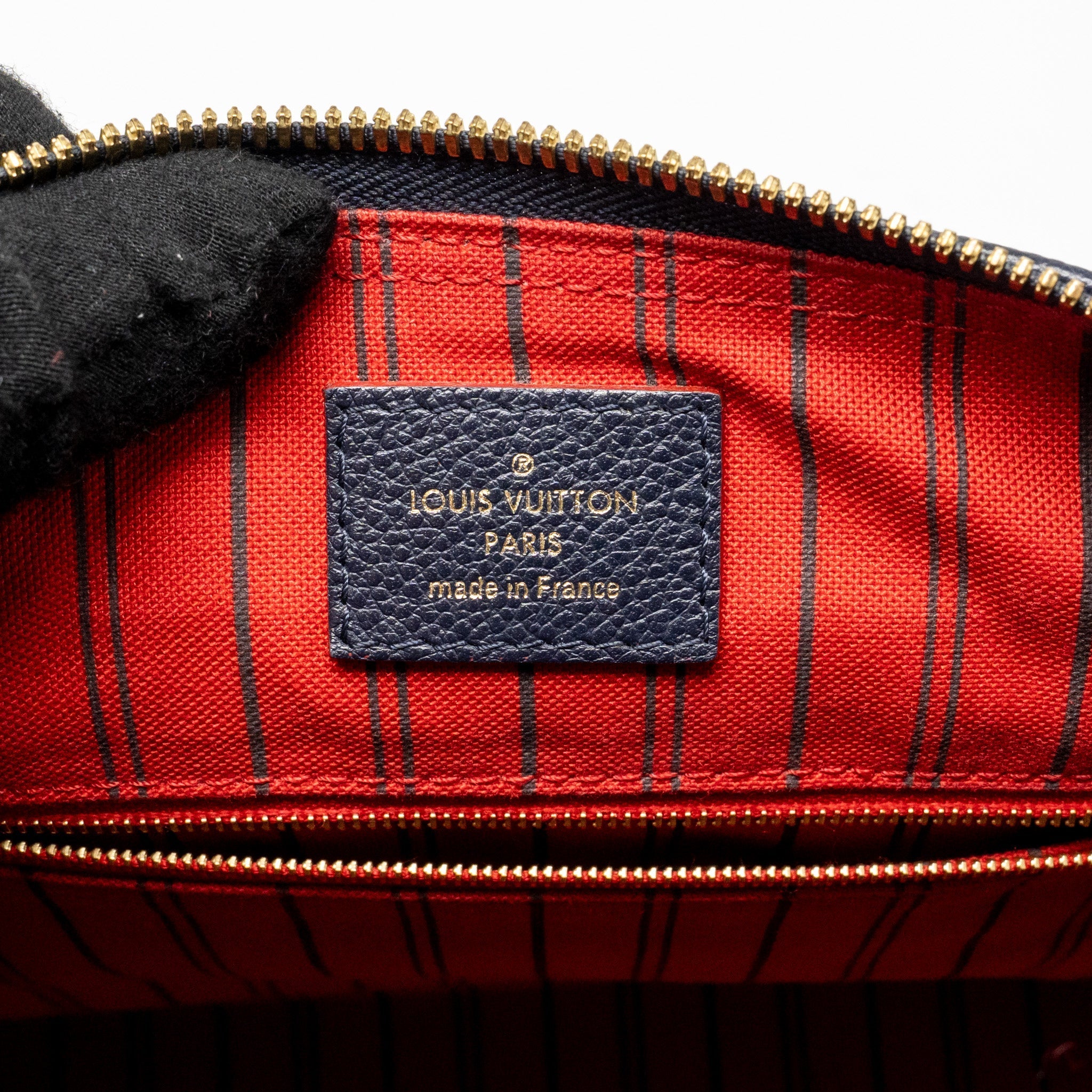 LOUIS VUITTON SPEEDY 25 BANDOULIERE MONOGRAM EMPREINTE NAVY / RED GHW