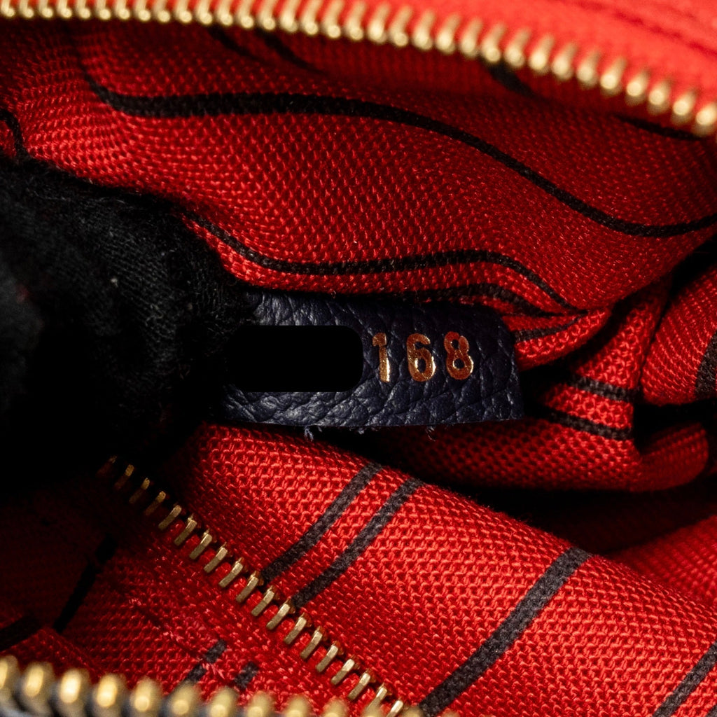 LOUIS VUITTON SPEEDY 25 BANDOULIERE MONOGRAM EMPREINTE NAVY / RED GHW