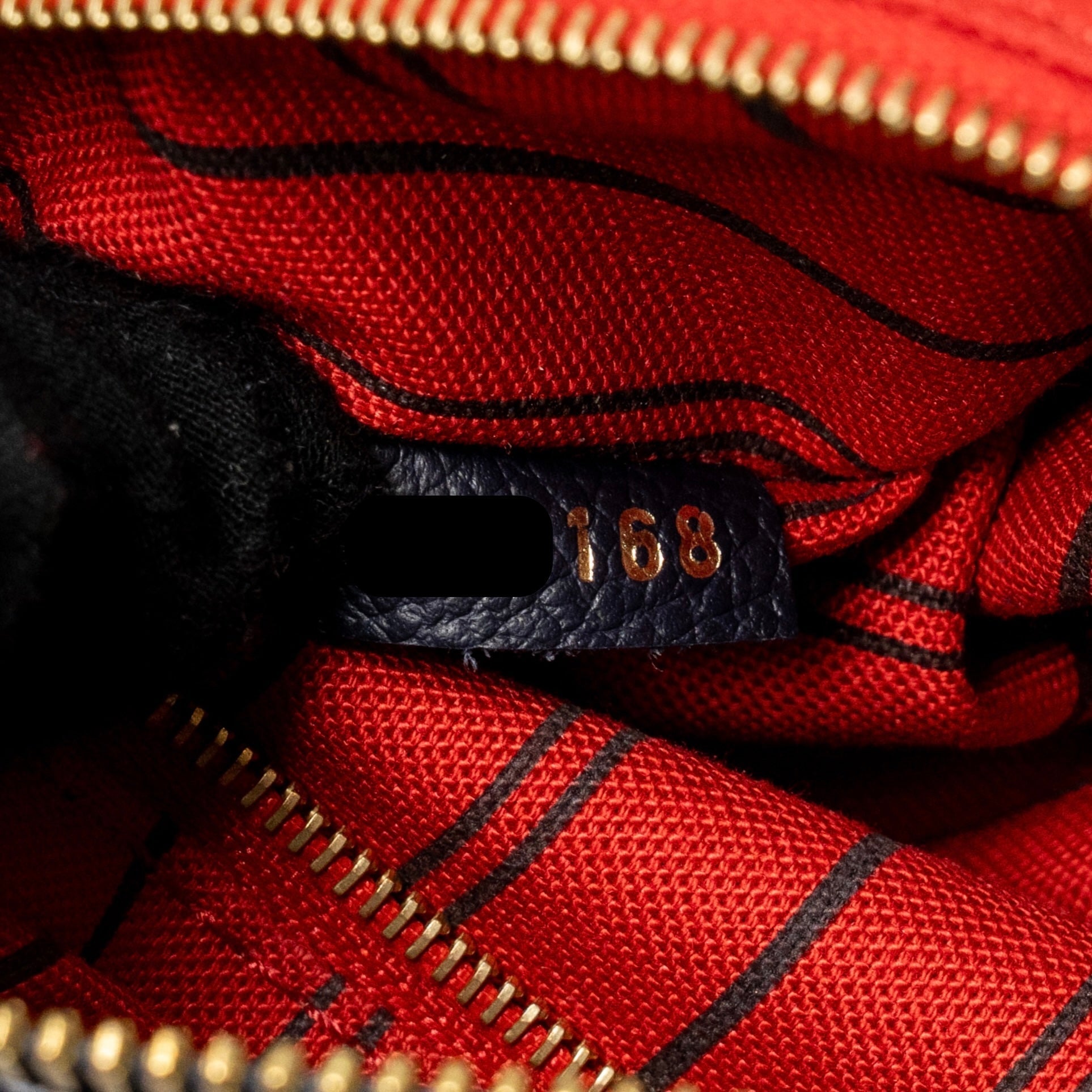 LOUIS VUITTON SPEEDY 25 BANDOULIERE MONOGRAM EMPREINTE NAVY / RED GHW