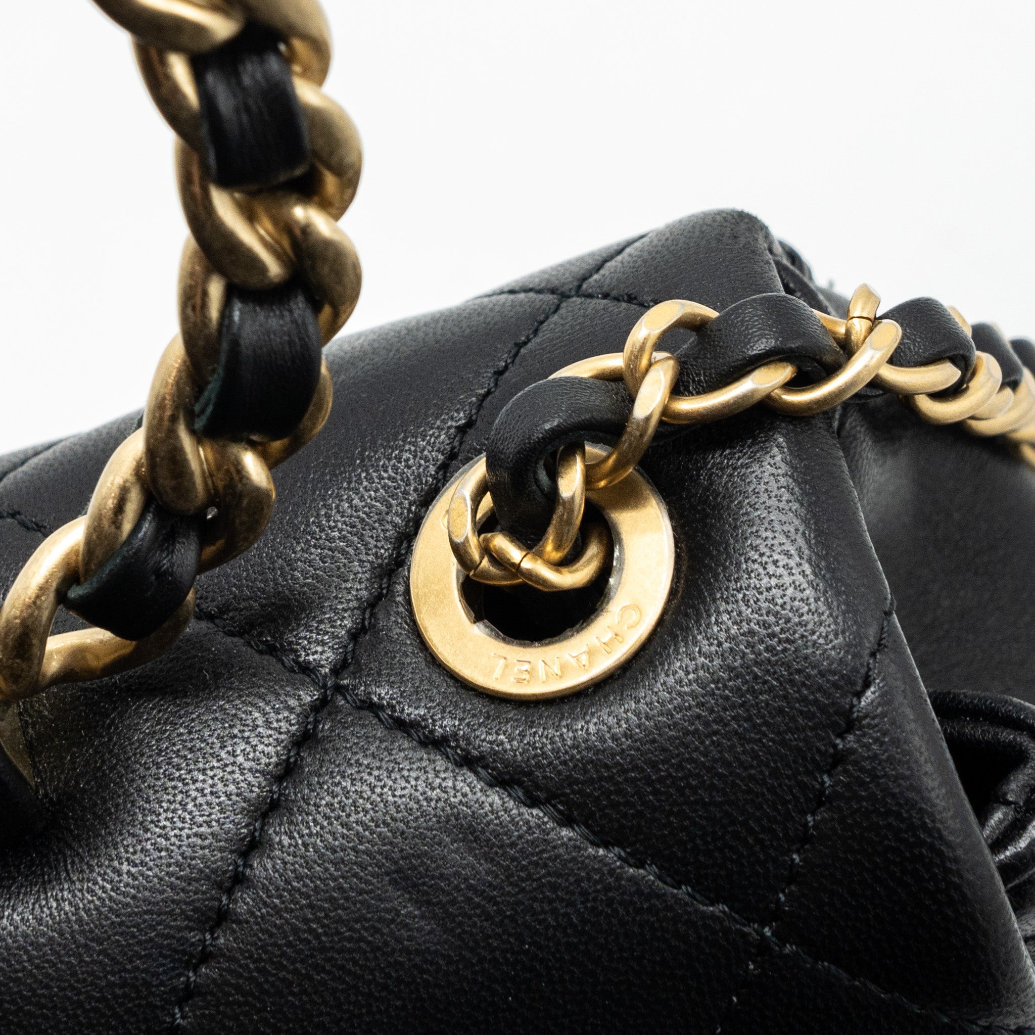CHANEL CIRCULAR HANDLE QUILTED FLAP BAG LAMBSKIN BLACK BRUSHED GHW