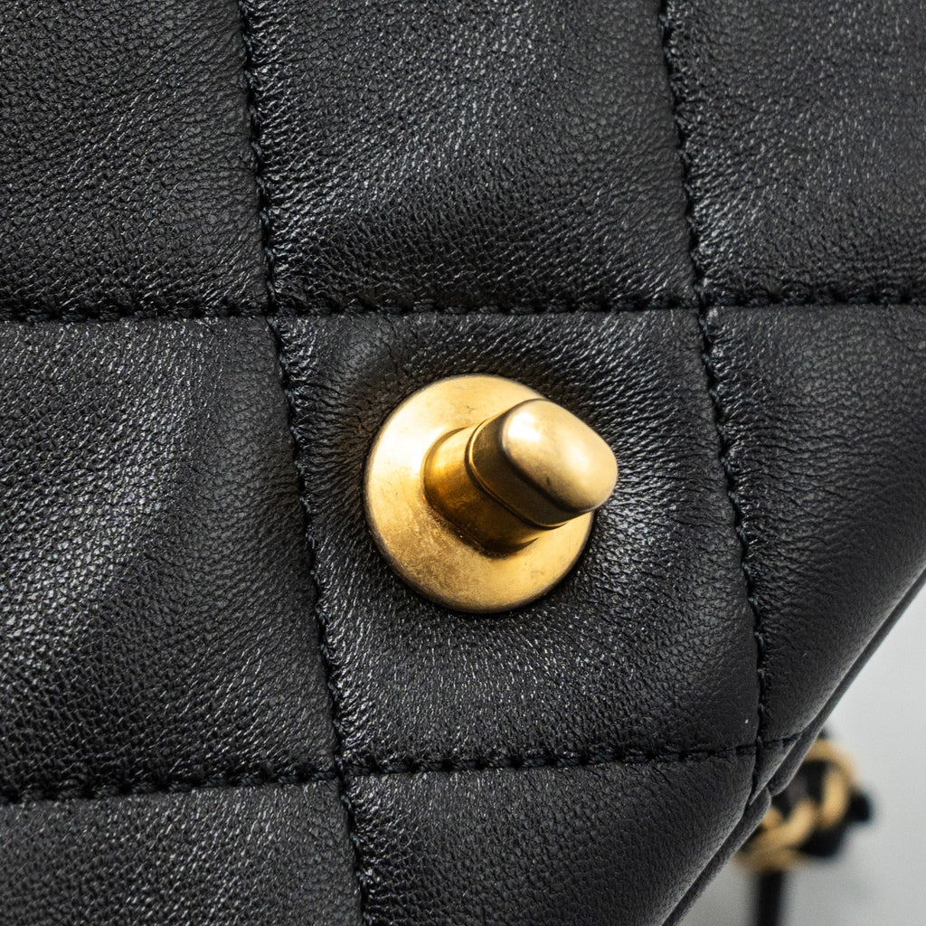 CHANEL CIRCULAR HANDLE QUILTED FLAP BAG LAMBSKIN BLACK BRUSHED GHW